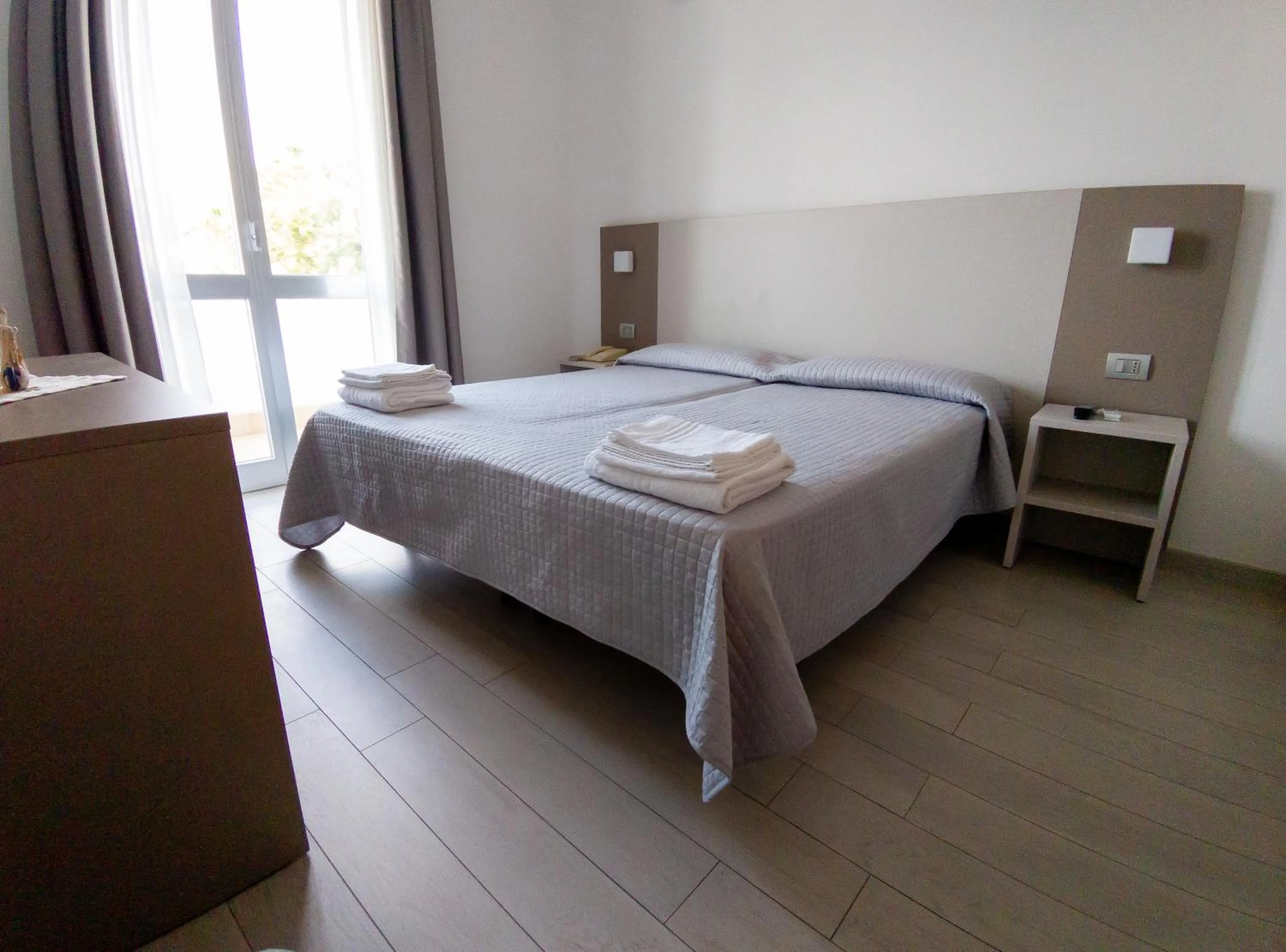 Bed in Hotel Capitano