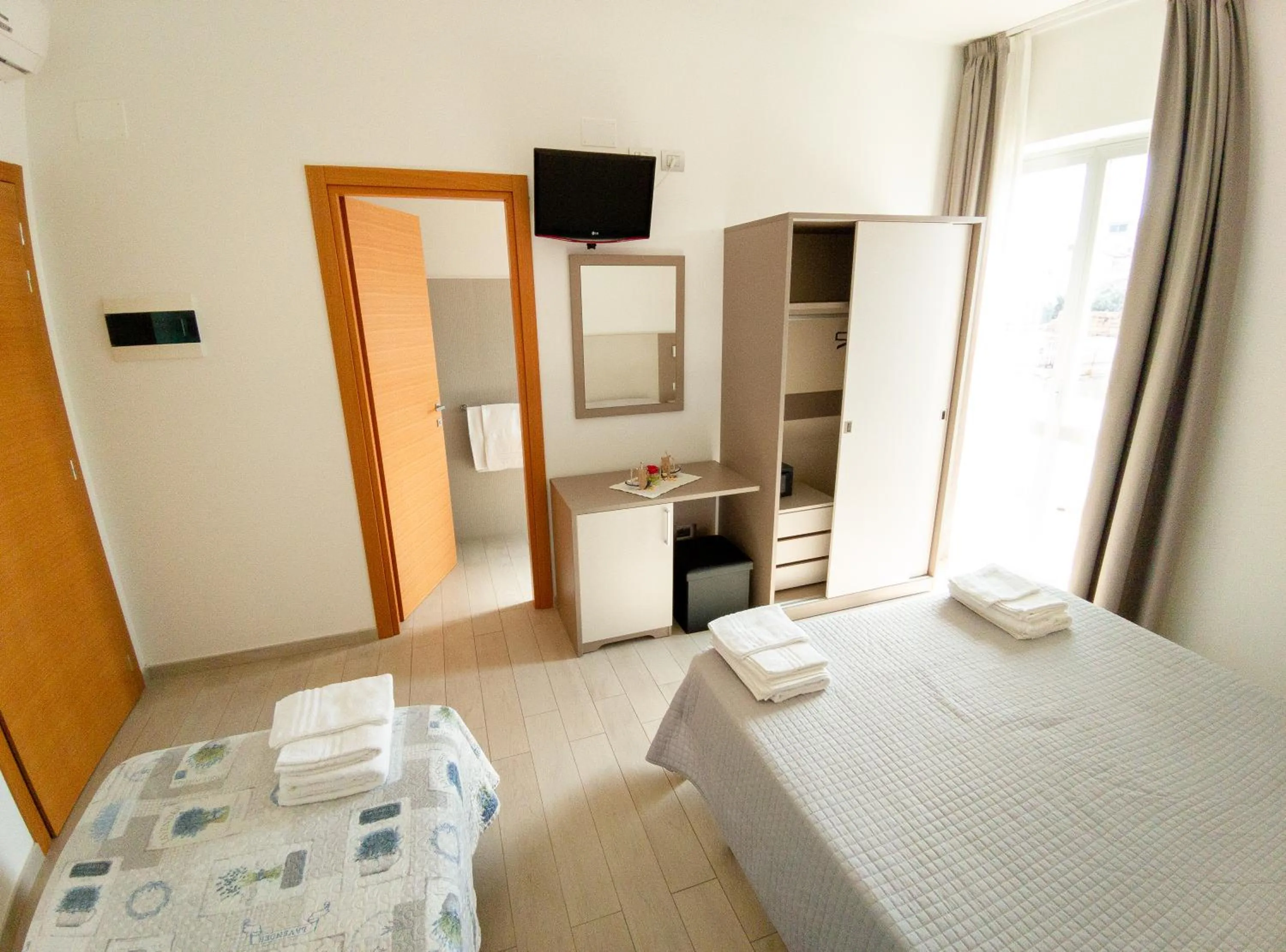 Bedroom, Bed in Hotel Capitano