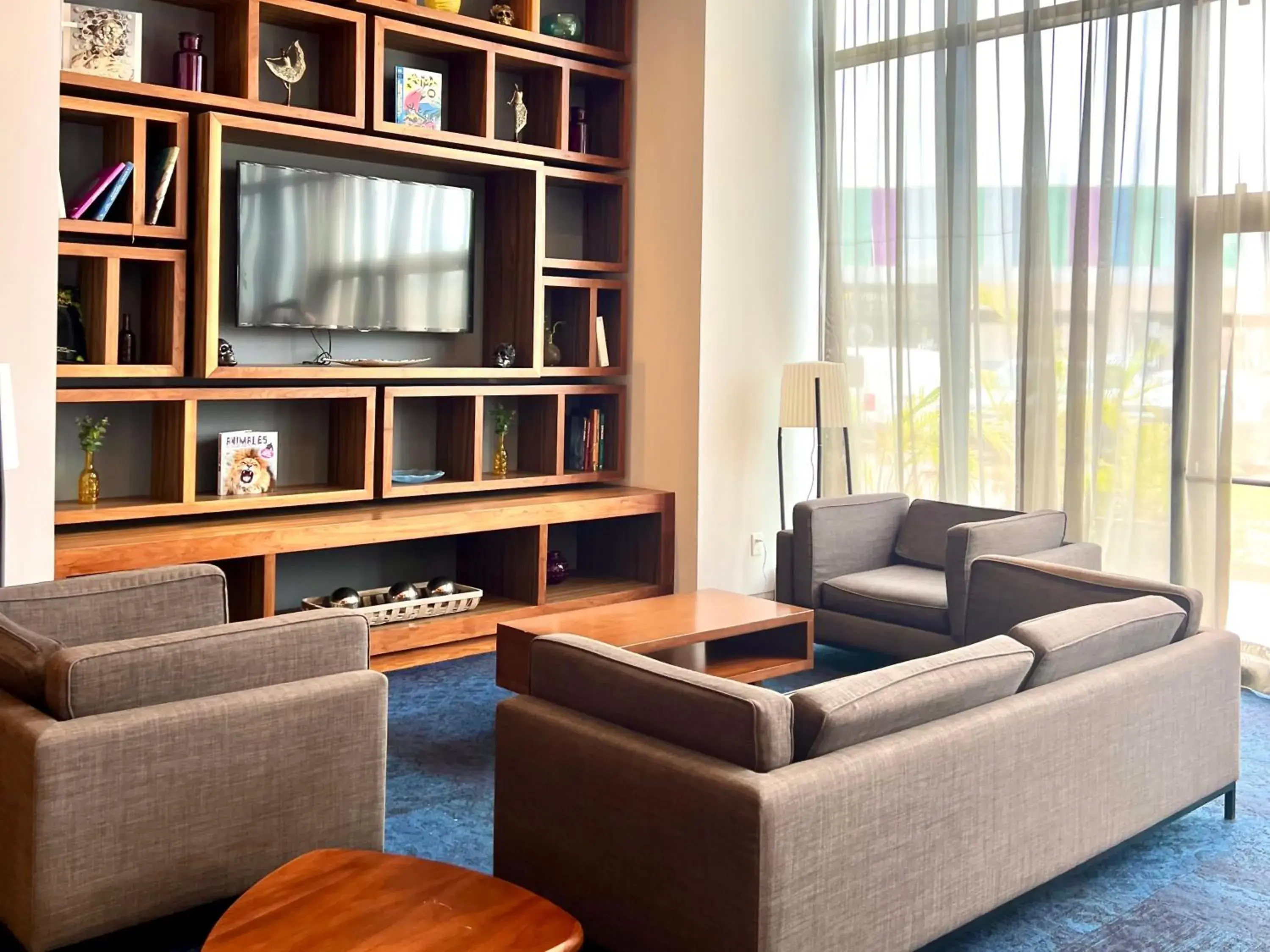 Living room in Fiesta Inn Express Cancún Cumbres Living room in Fiesta Inn Express Cancún Cumbres