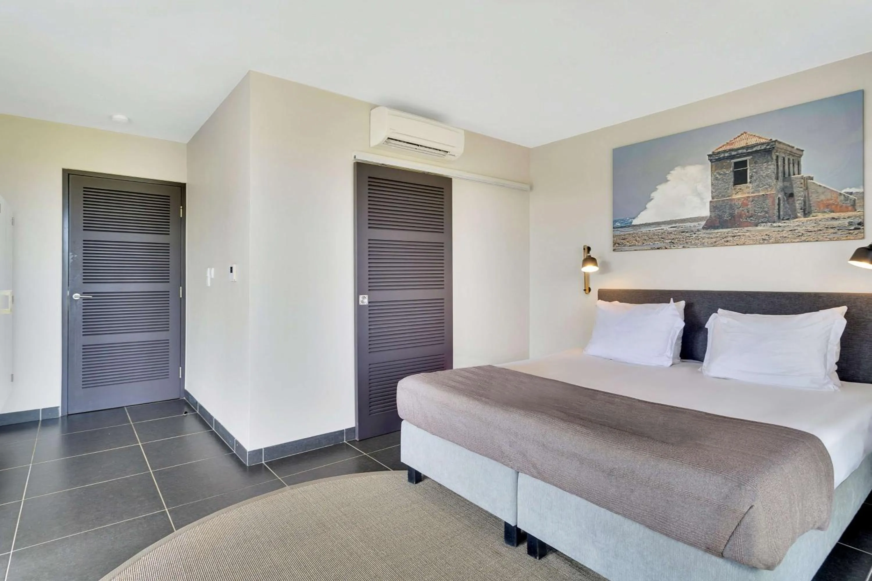 Two-Bedroom Apartment with Two King Beds - Ocean View in Delfins Beach Resort Bonaire, Tapestry Collection by Hilton