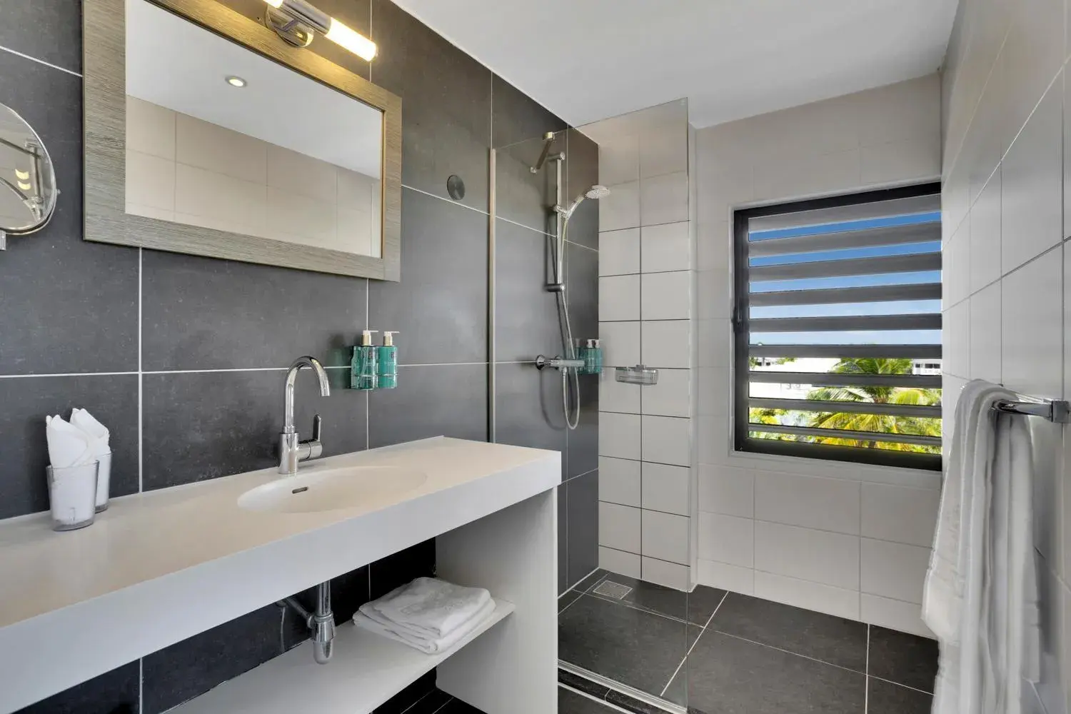 Bathroom in Delfins Beach Resort Bonaire, Tapestry Collection by Hilton Bathroom in Delfins Beach Resort Bonaire, Tapestry Collection by Hilton