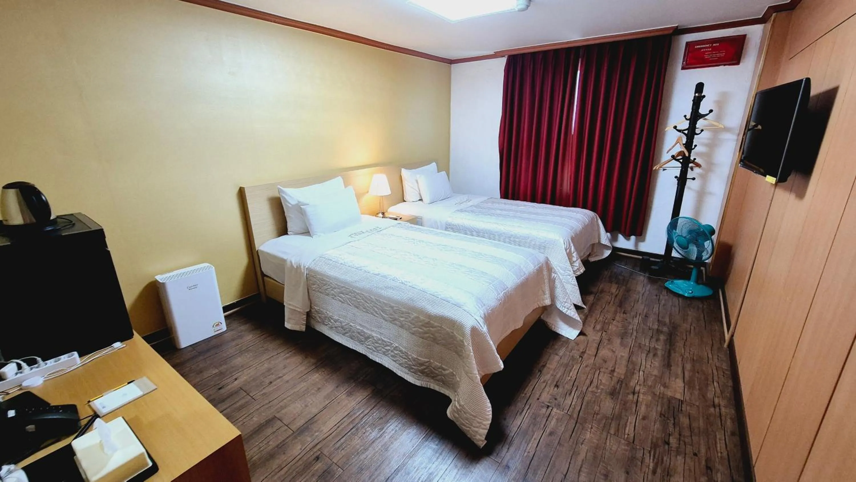 Bed in Kyungha Spa Hotel