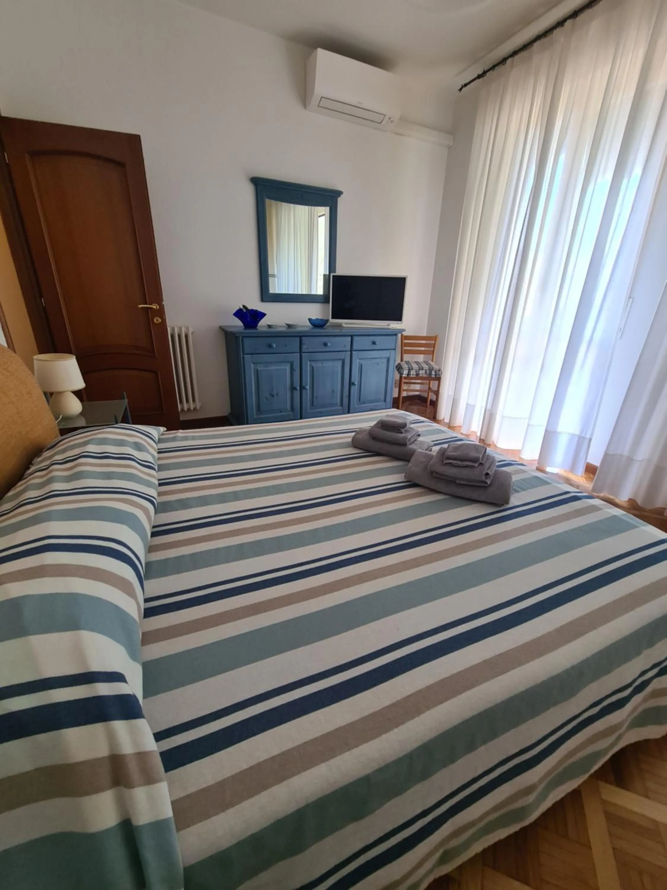 Bed in Turchino Apartment & Terrazza della Luisa by PortofinoVacanze