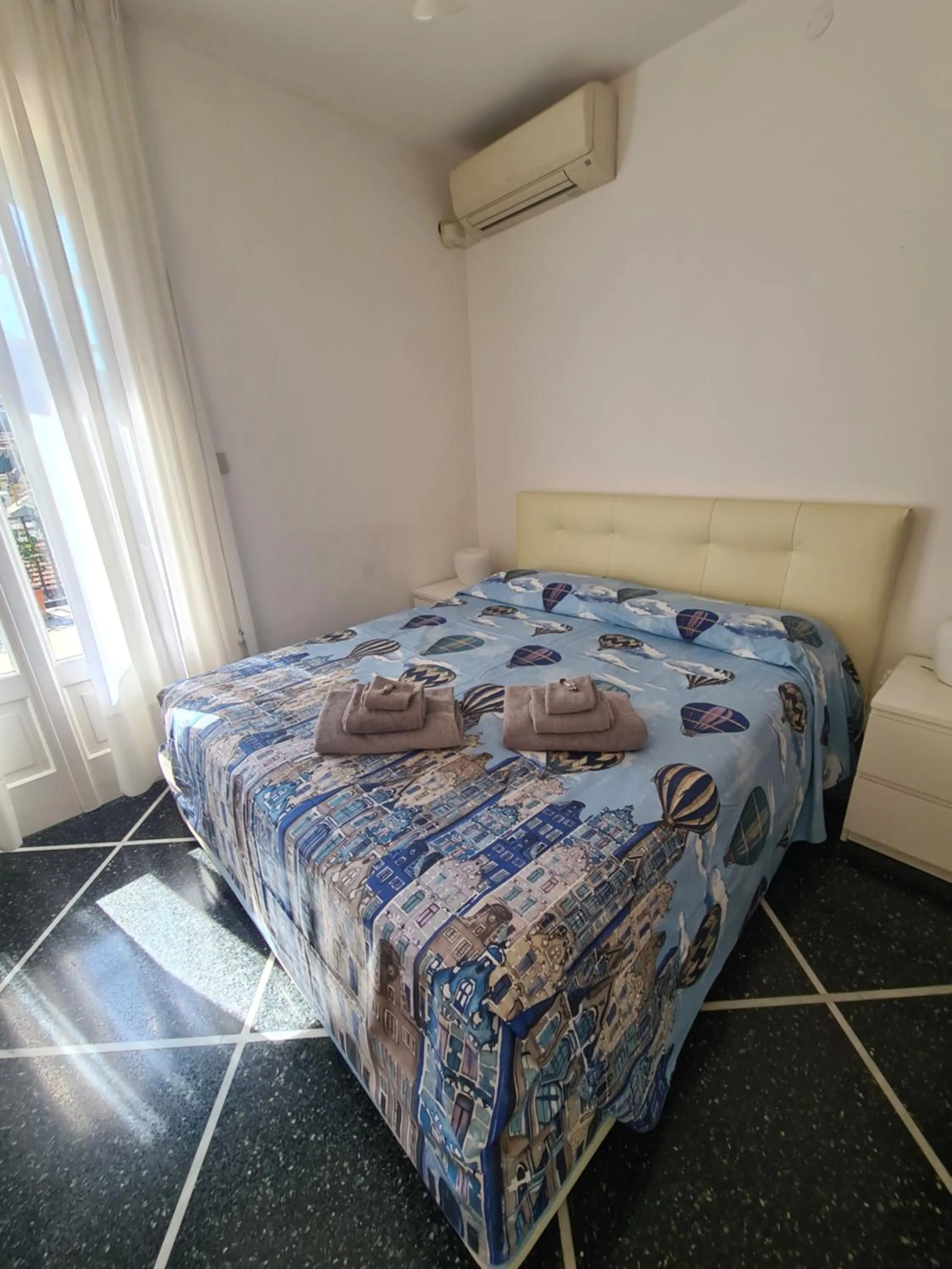 Bed in Turchino Apartment & Terrazza della Luisa by PortofinoVacanze