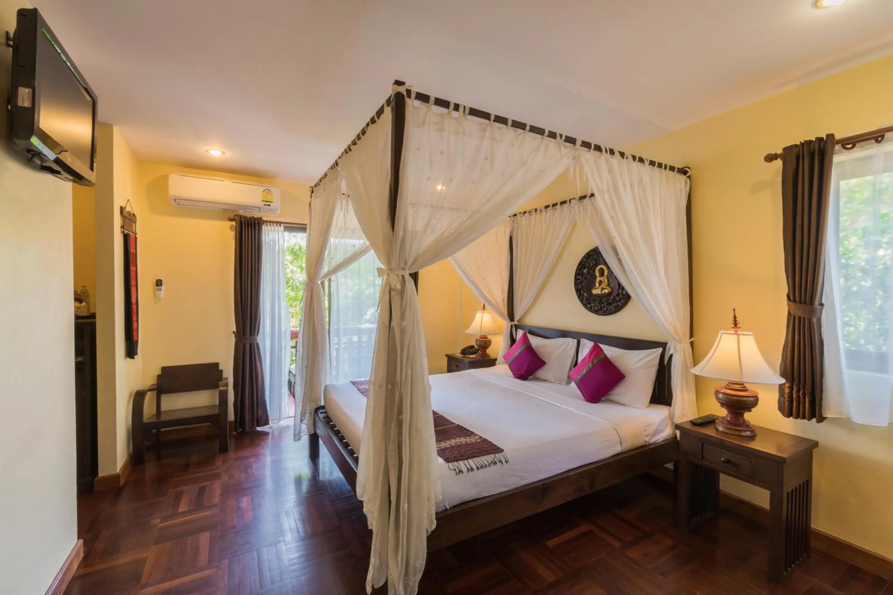 Photo of the whole room, Bed in Coral Hotel Bangsaphan