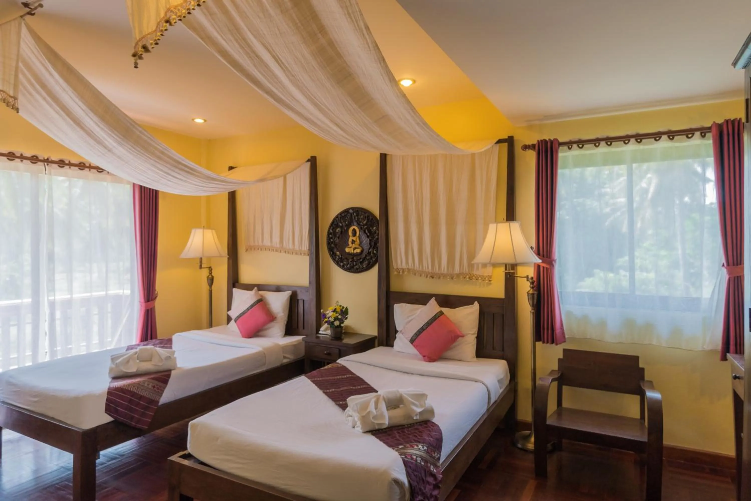 Photo of the whole room, Bed in Coral Hotel Bangsaphan