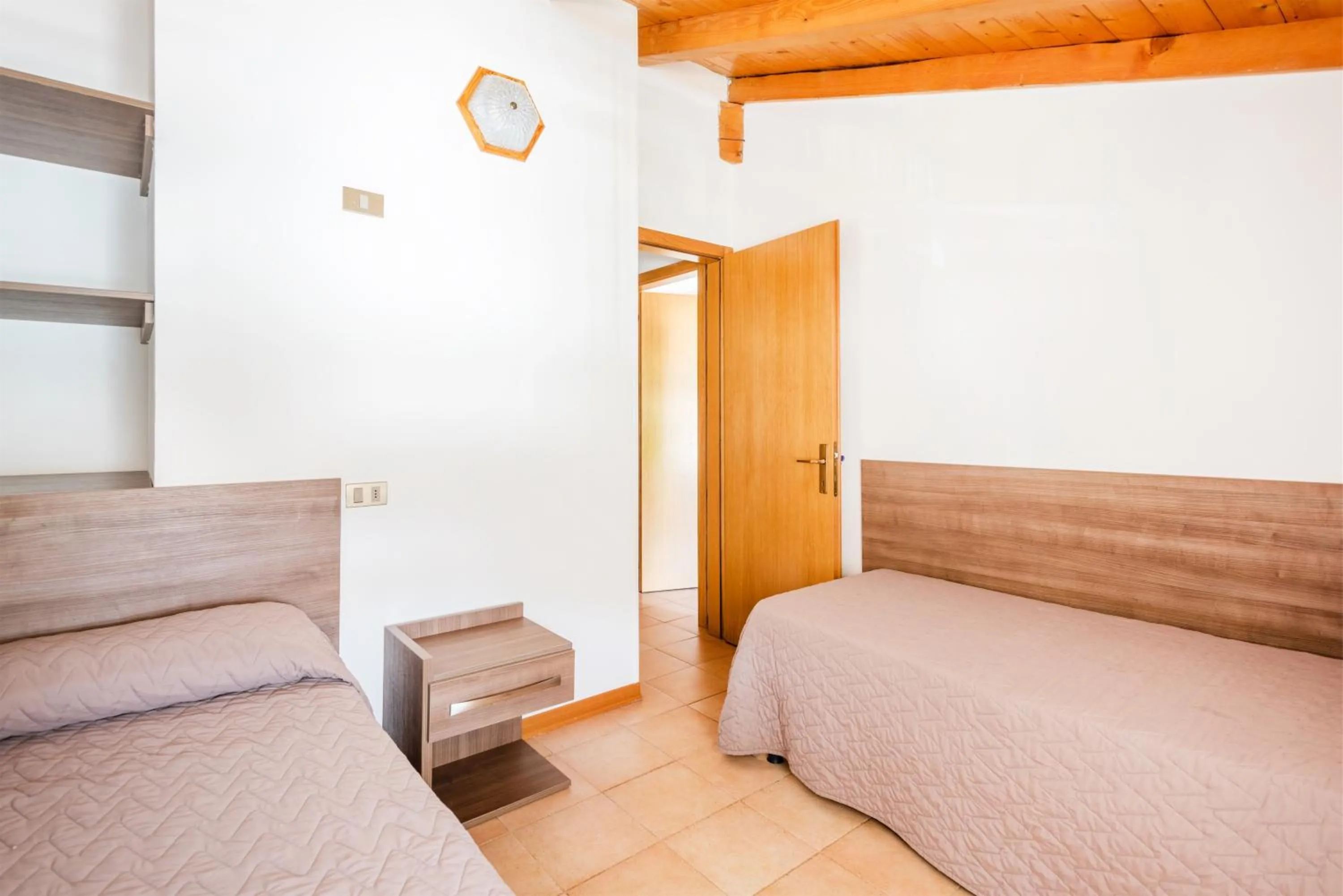 Bed in CROSINA HOLIDAY - Casa Lucia