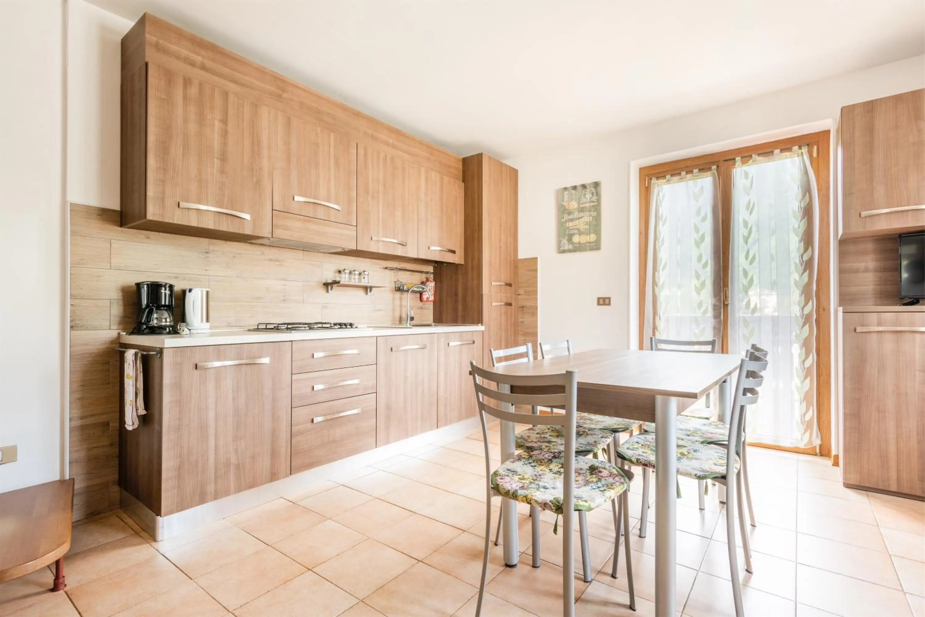 Kitchen or kitchenette in CROSINA HOLIDAY - Casa Lucia
