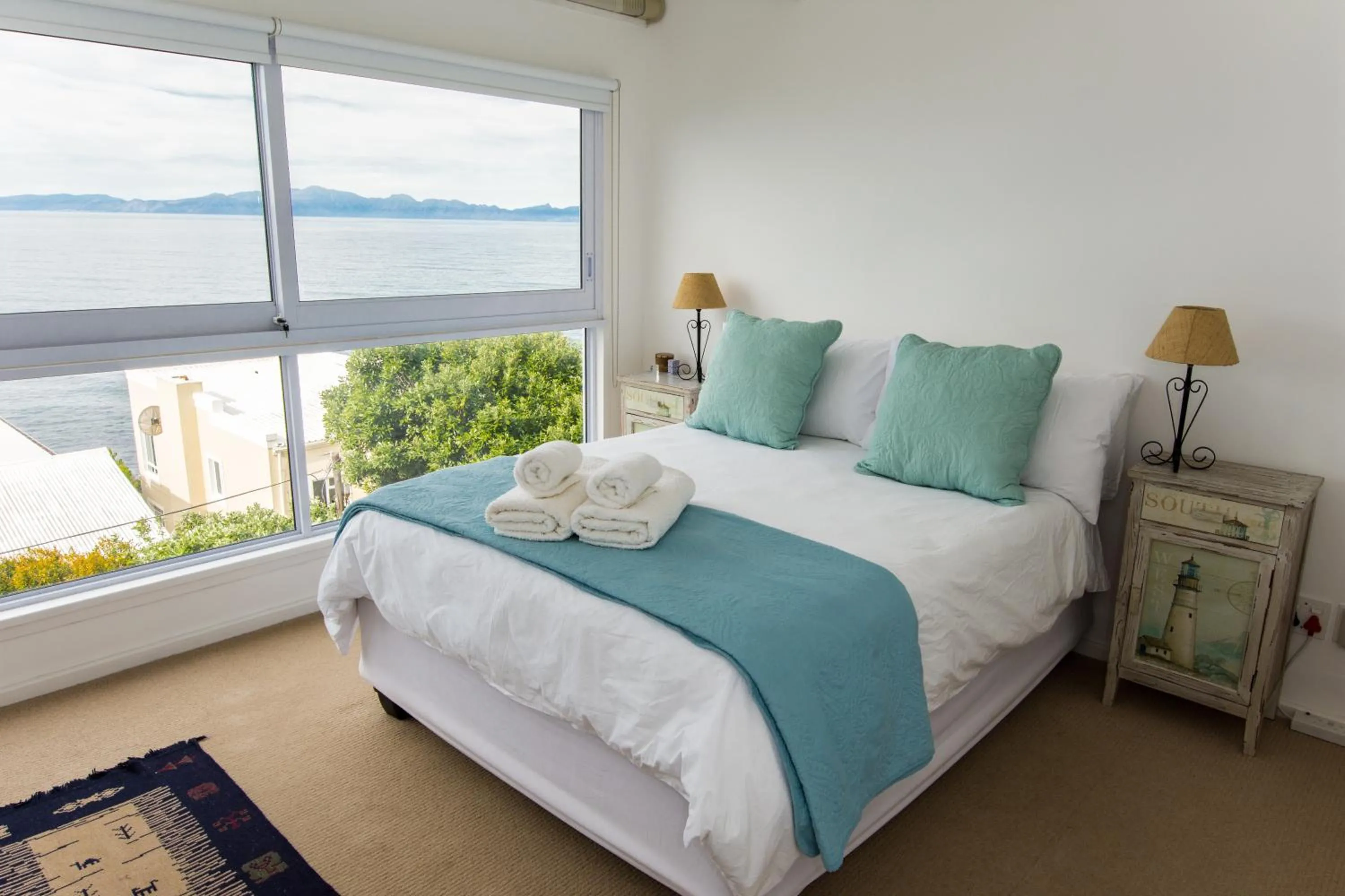 Bed in Quarterdeck Holiday Apartment