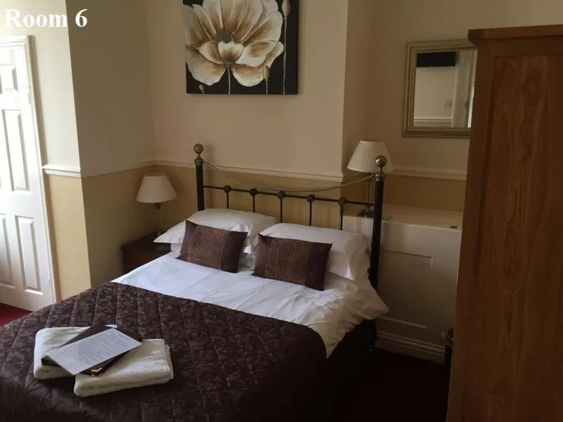 Bed in The Arches Guest House