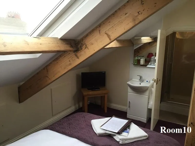 Bed in The Arches Guest House