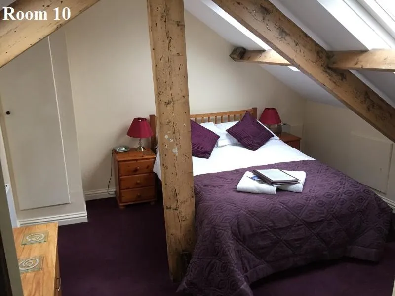 Bed in The Arches Guest House