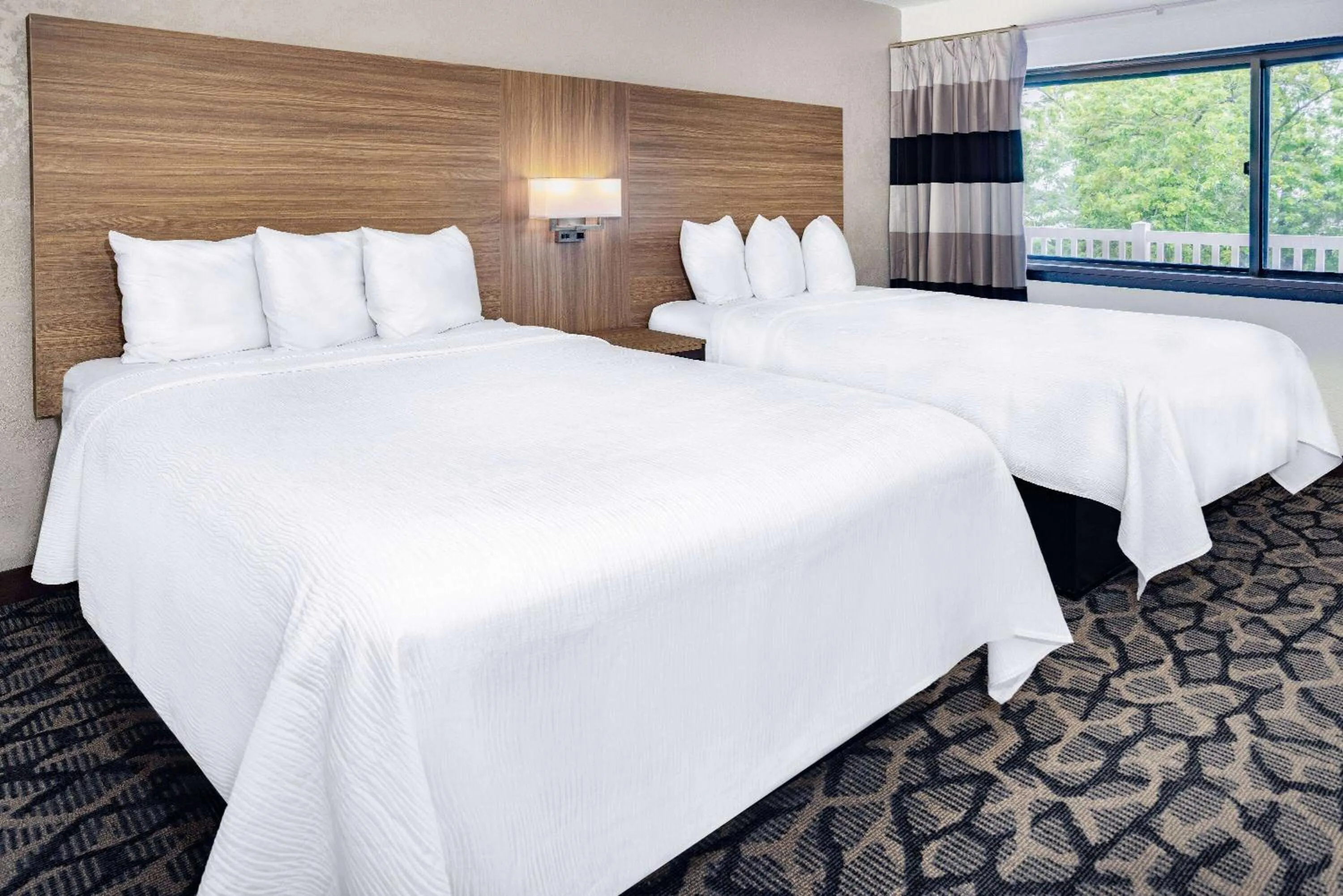 Photo of the whole room, Bed in Ramada by Wyndham West Atlantic City