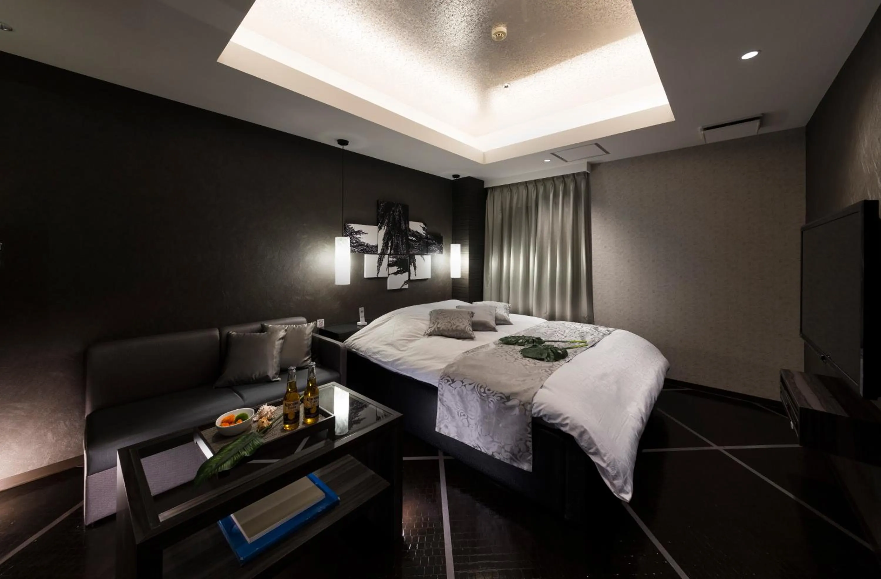 Photo of the whole room, Bed in Hotel Plant Garden Resort (Adult Only)