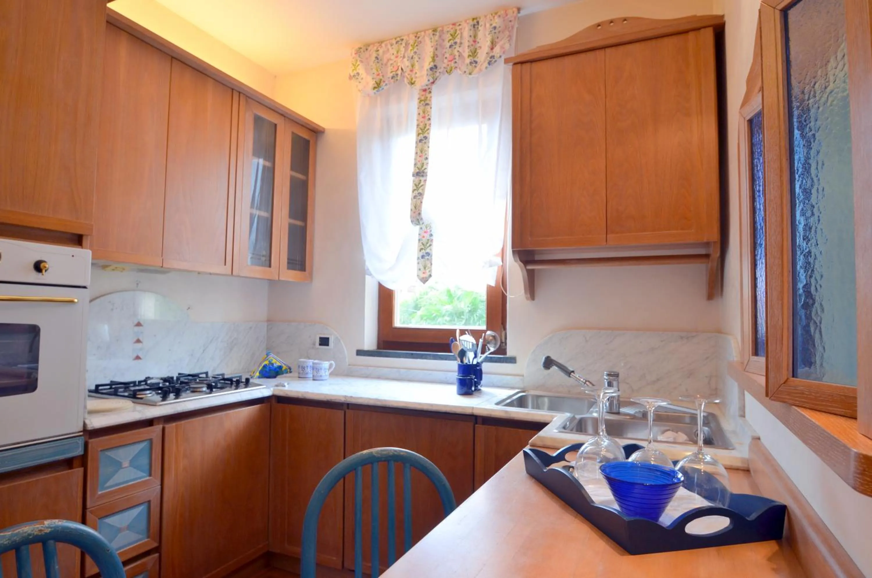 Communal kitchen in Villa Soprana by Agenzia SolturElba