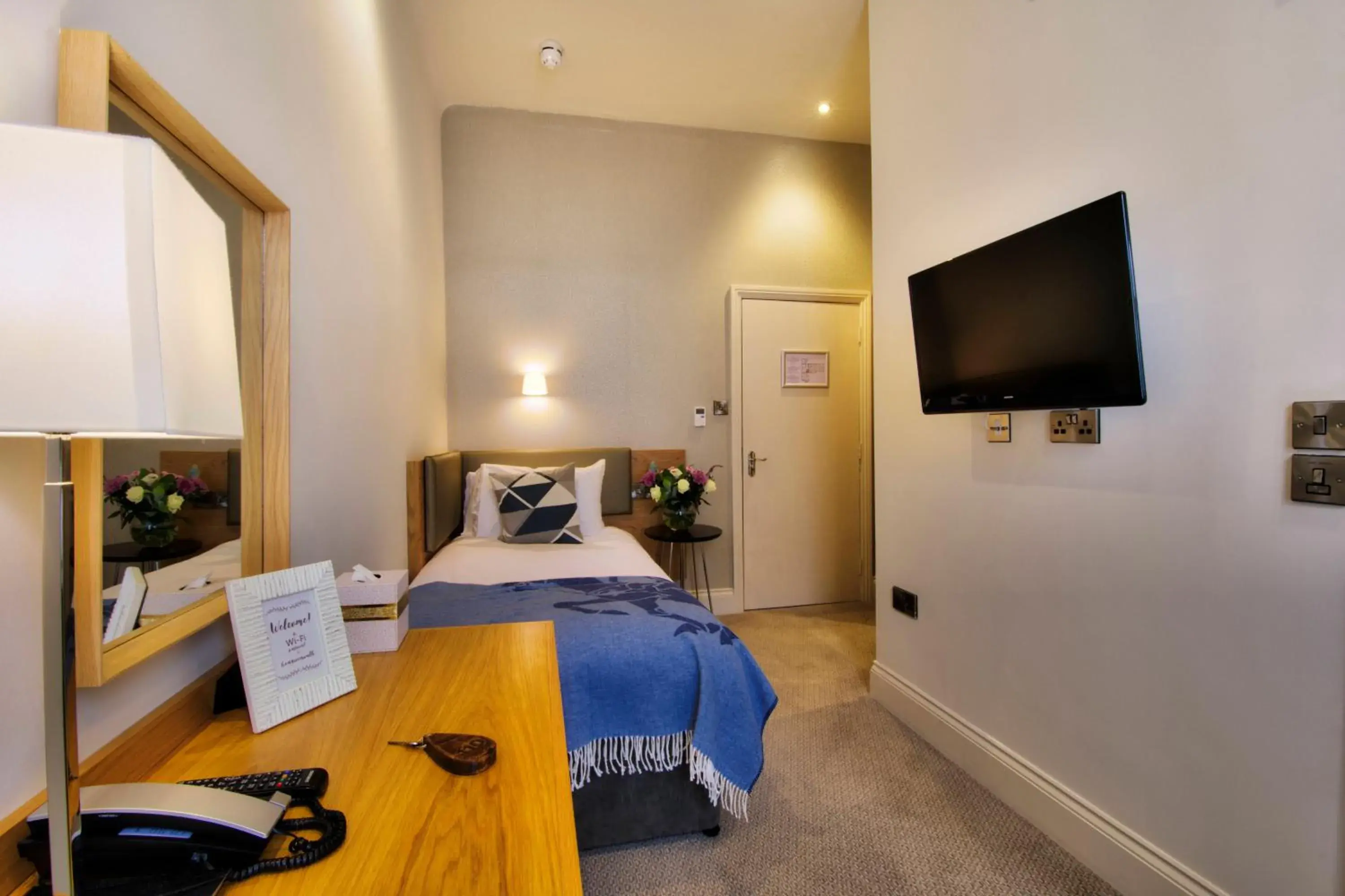 Deluxe Single Room in The Orchid Hotel Deluxe Single Room in The Orchid Hotel