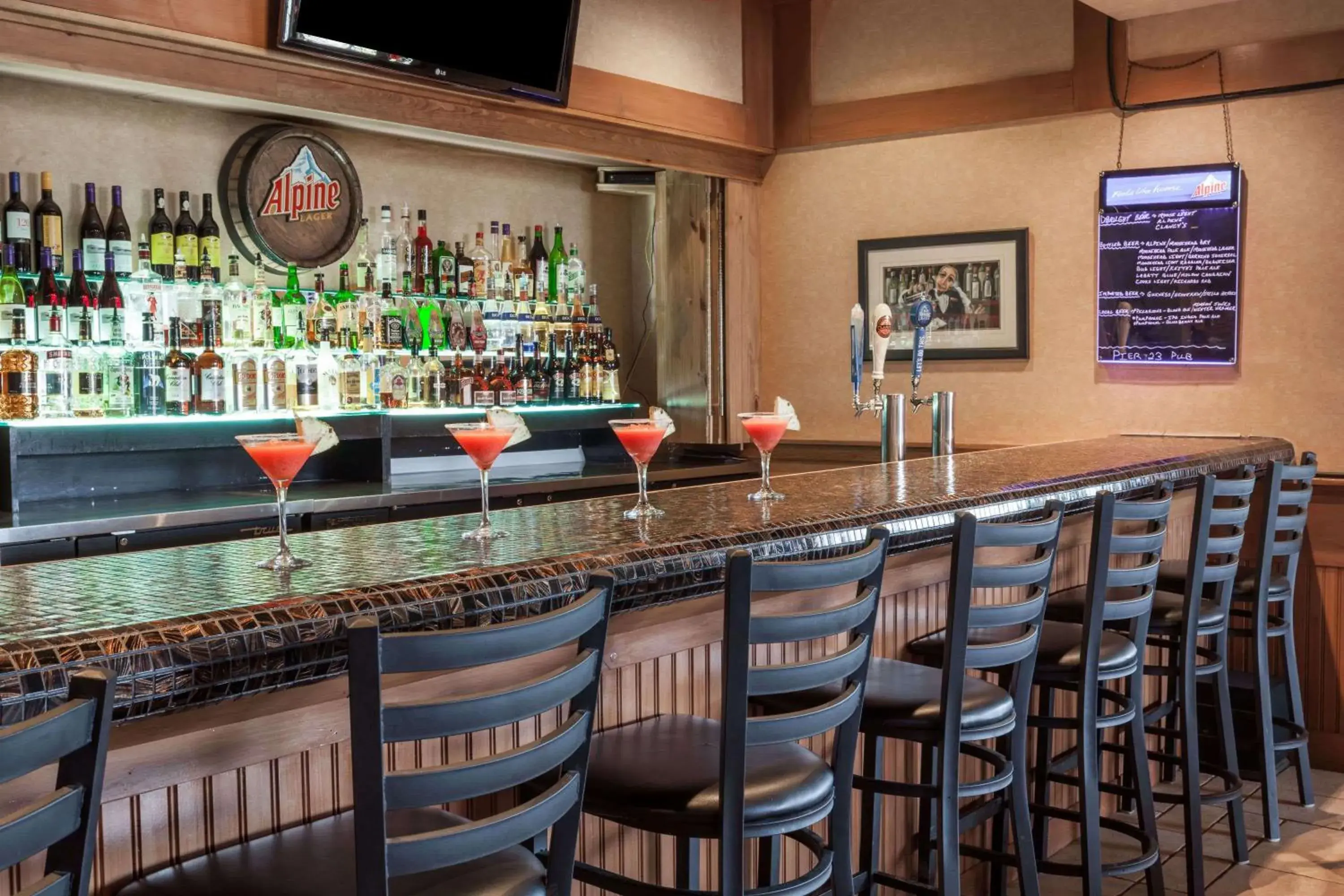 Lounge or bar in Ramada by Wyndham Fredericton Lounge or bar in Ramada by Wyndham Fredericton