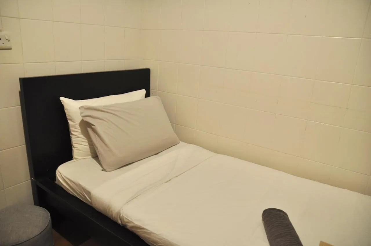 Bed in GRAYHAUS Guest House