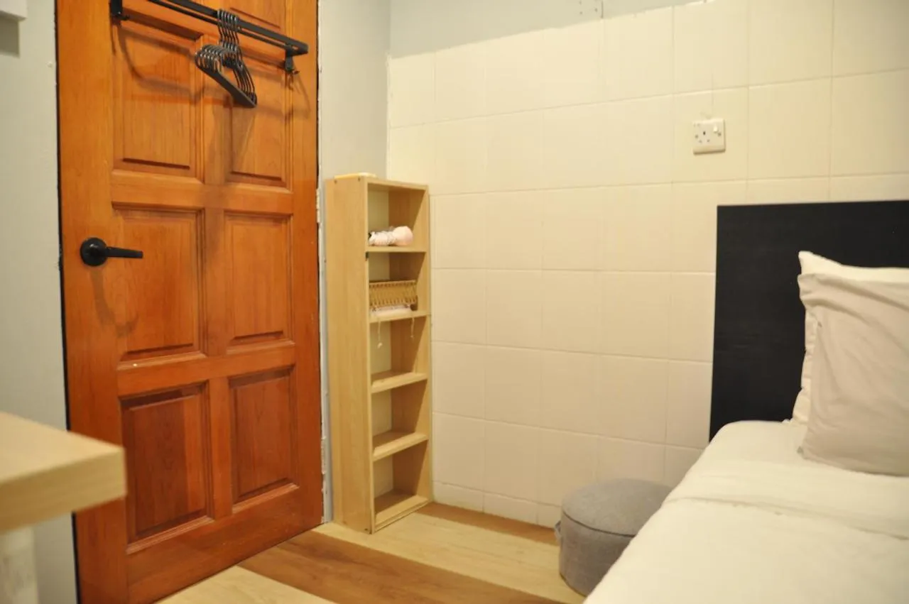 Bed in GRAYHAUS Guest House