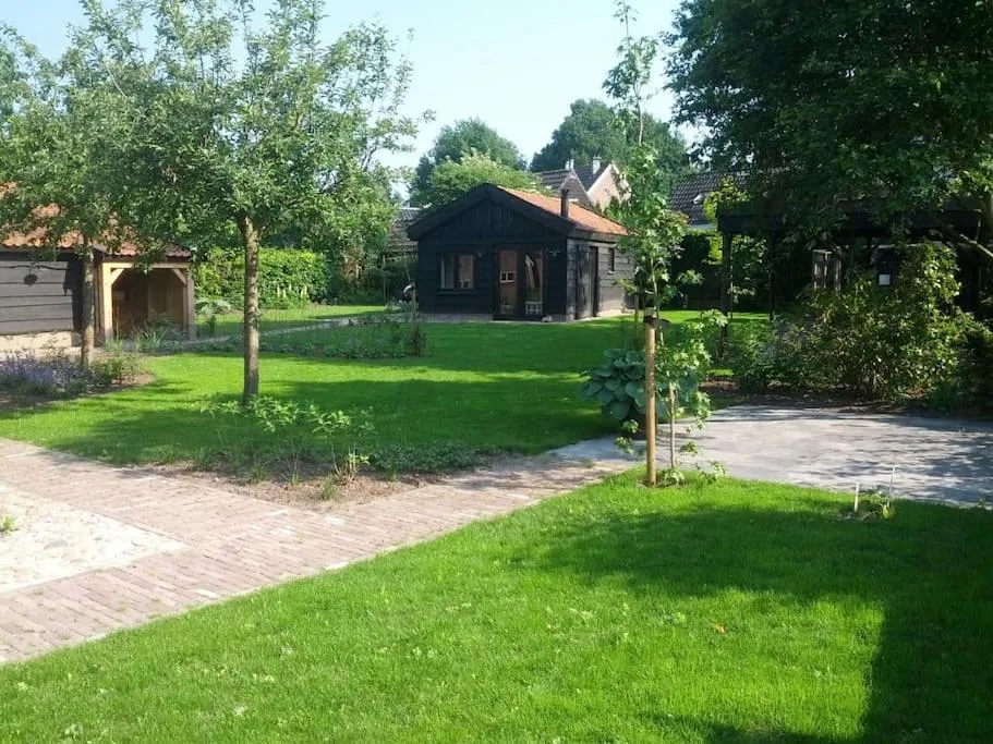 Garden in Vakantiehuisje met bedstee