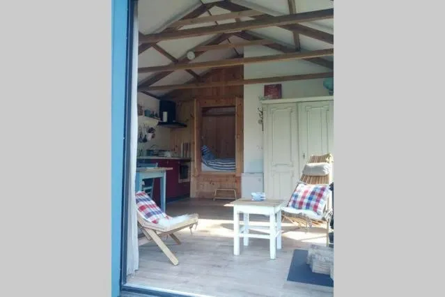 Living room in Vakantiehuisje met bedstee