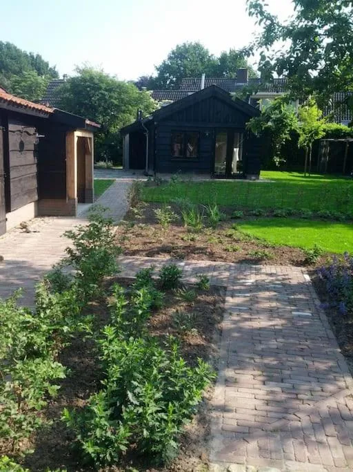 Garden in Vakantiehuisje met bedstee