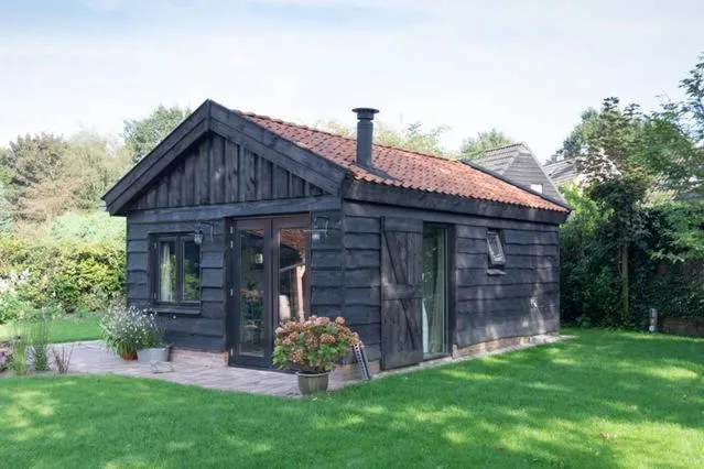 Garden in Vakantiehuisje met bedstee