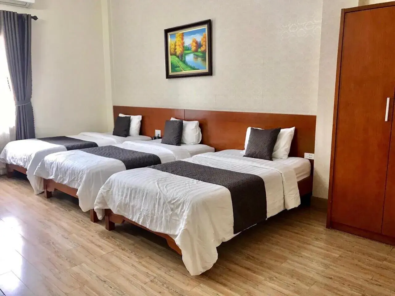 Triple Room in Royal Hotel Ha Giang Triple Room in Royal Hotel Ha Giang
