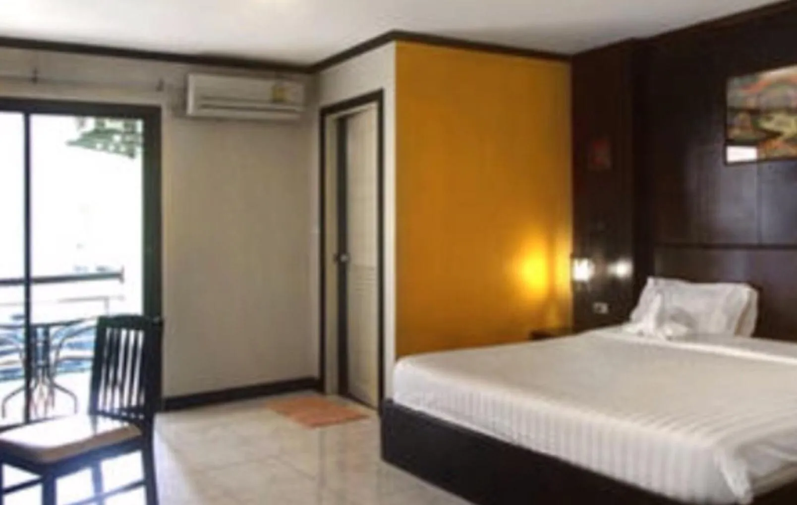 Bed in Baantonkhaokata Hotel