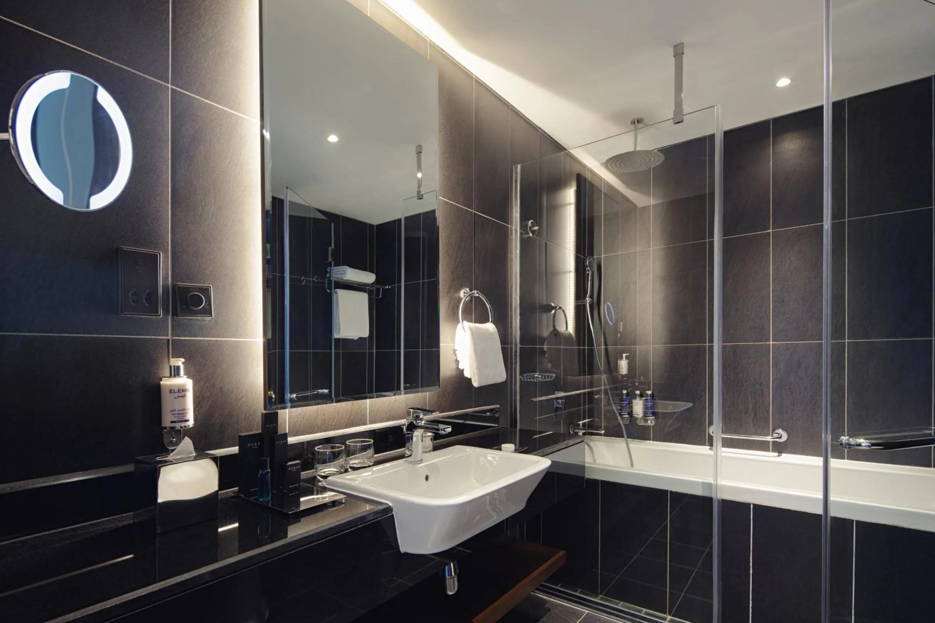 Bathroom in Dukes The Palm Dubai Hotel