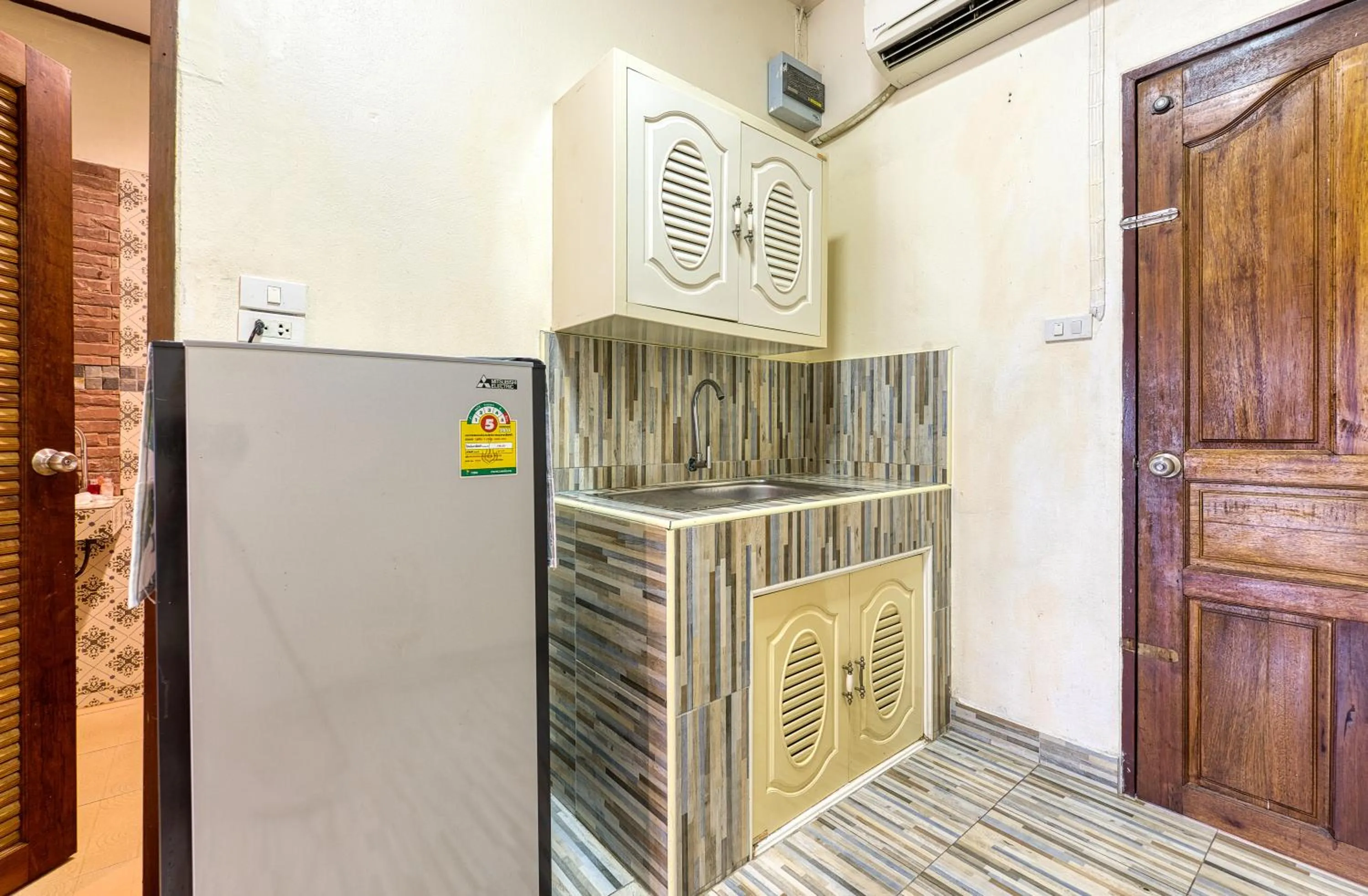 Kitchen or kitchenette in The Bulin Residence