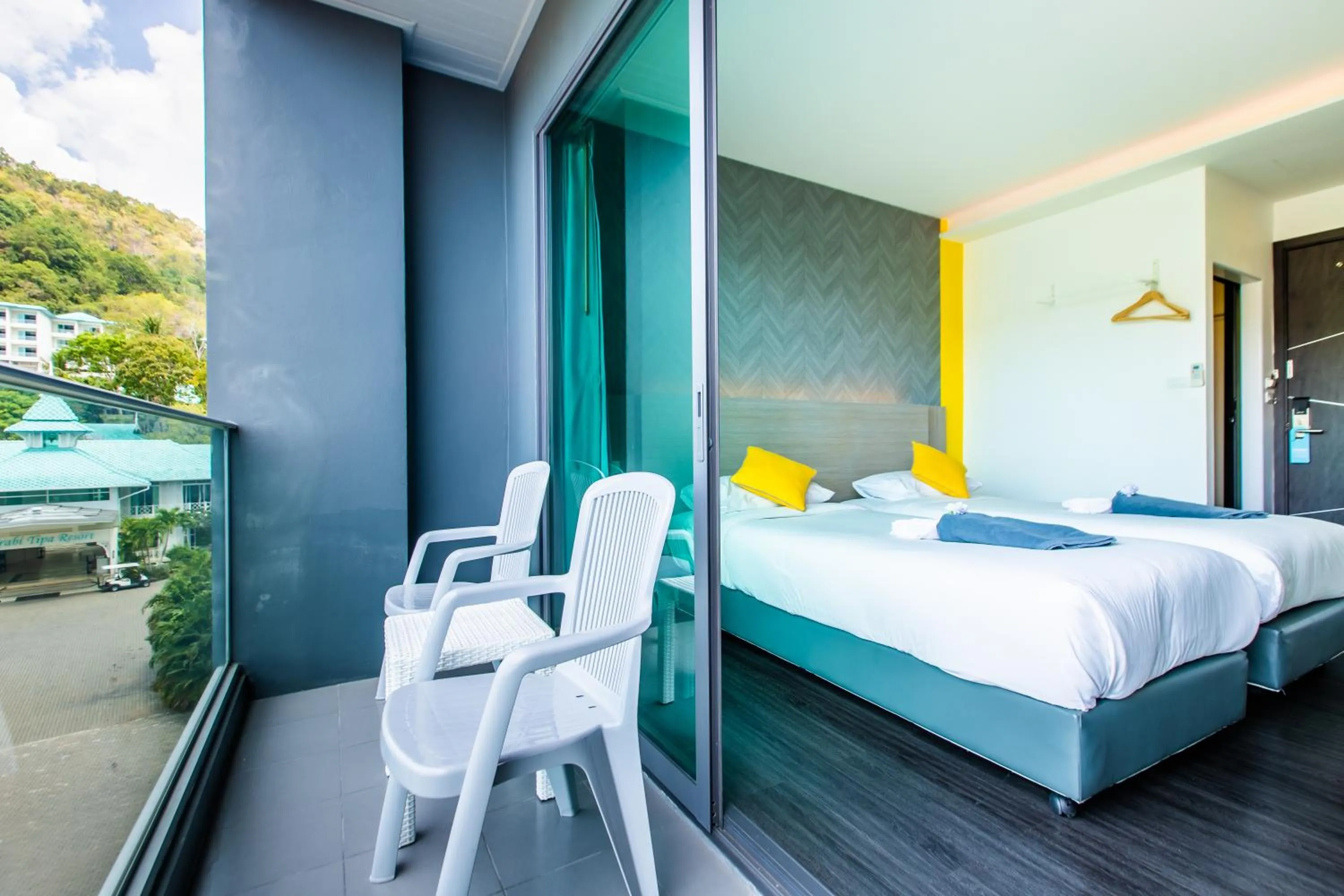 Bed in Wake Up Aonang Hotel