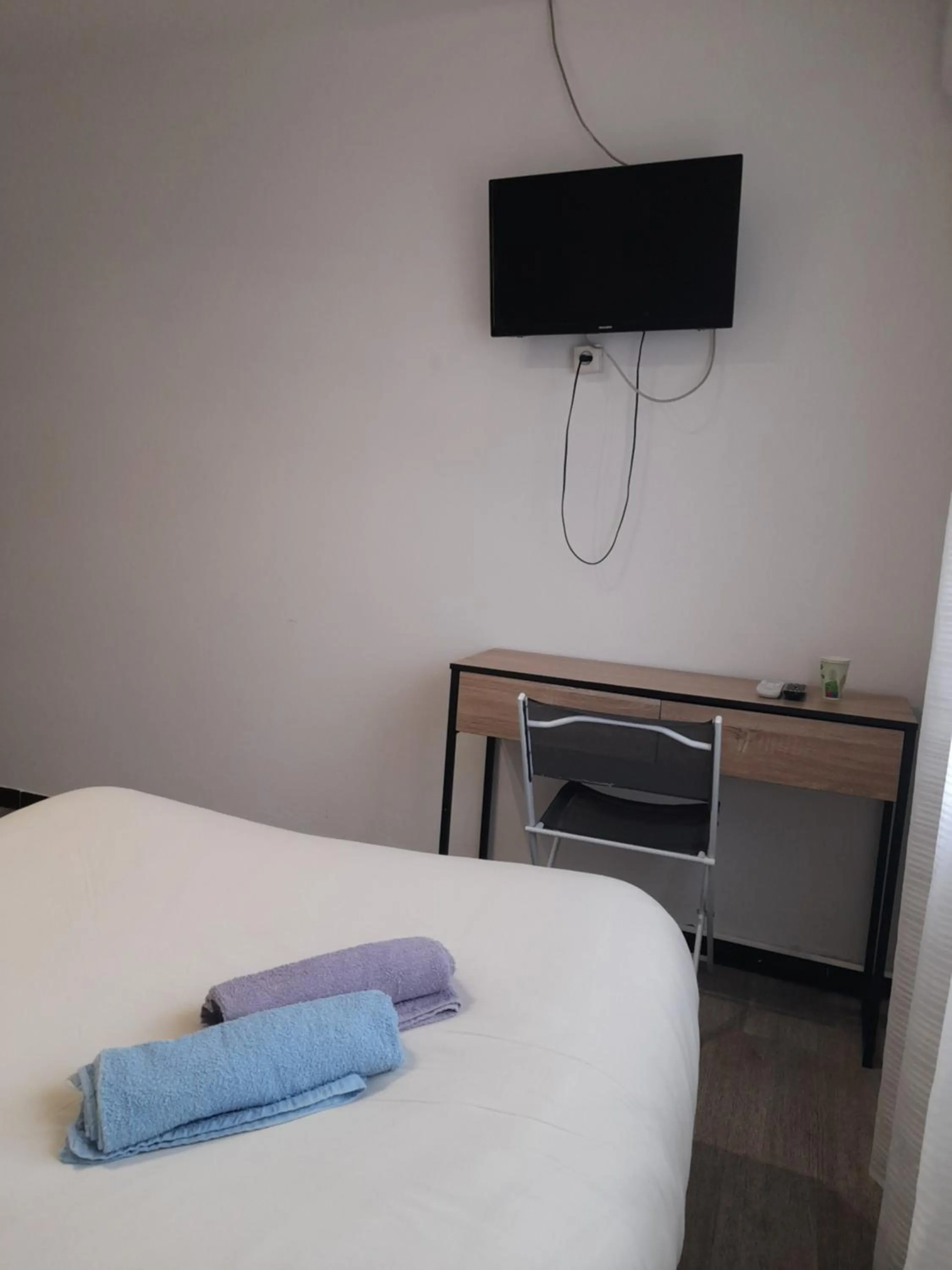 Bed in Hotel Restaurant Calypso