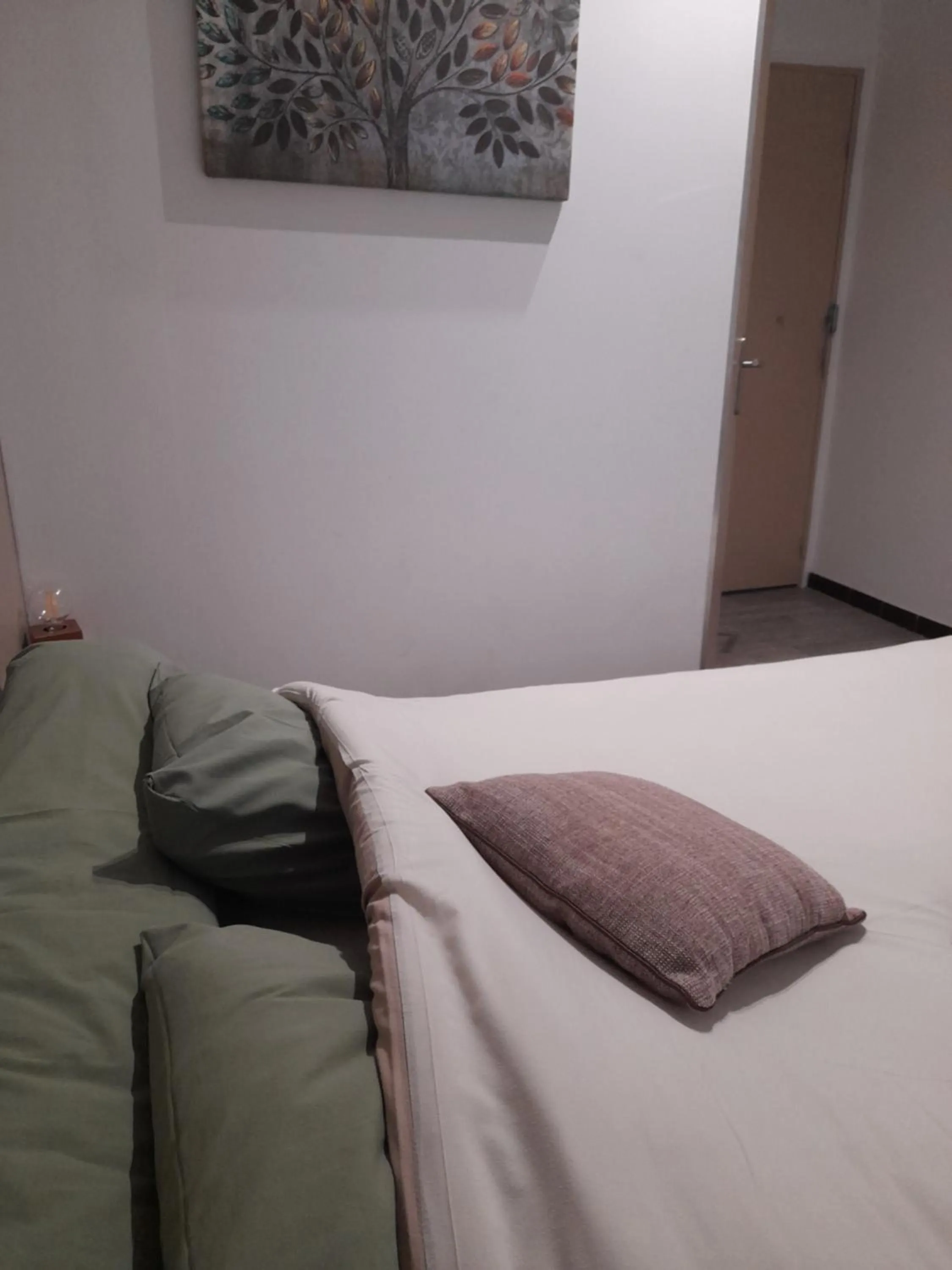 Bed in Hotel Restaurant Calypso
