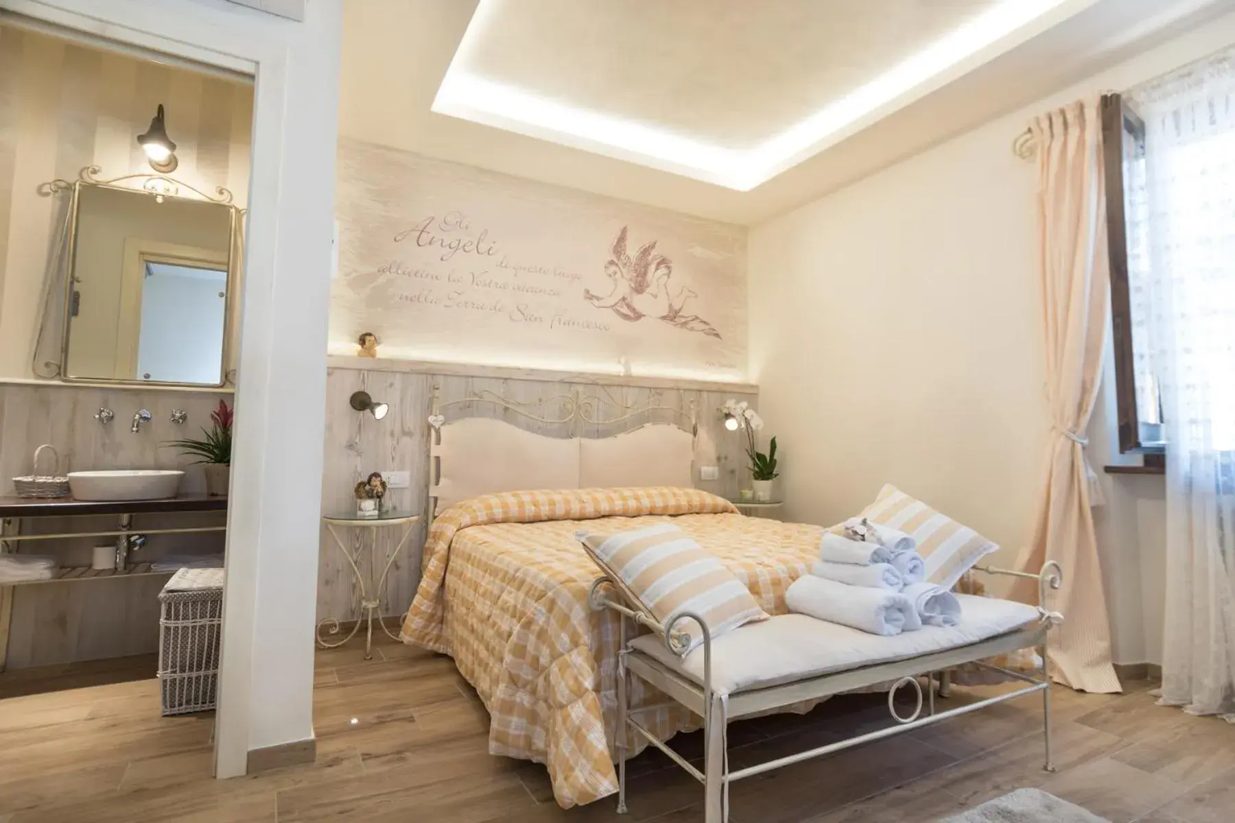 Quadruple Room with Private Bathroom in Il Giardino degli Angeli Quadruple Room with Private Bathroom in Il Giardino degli Angeli