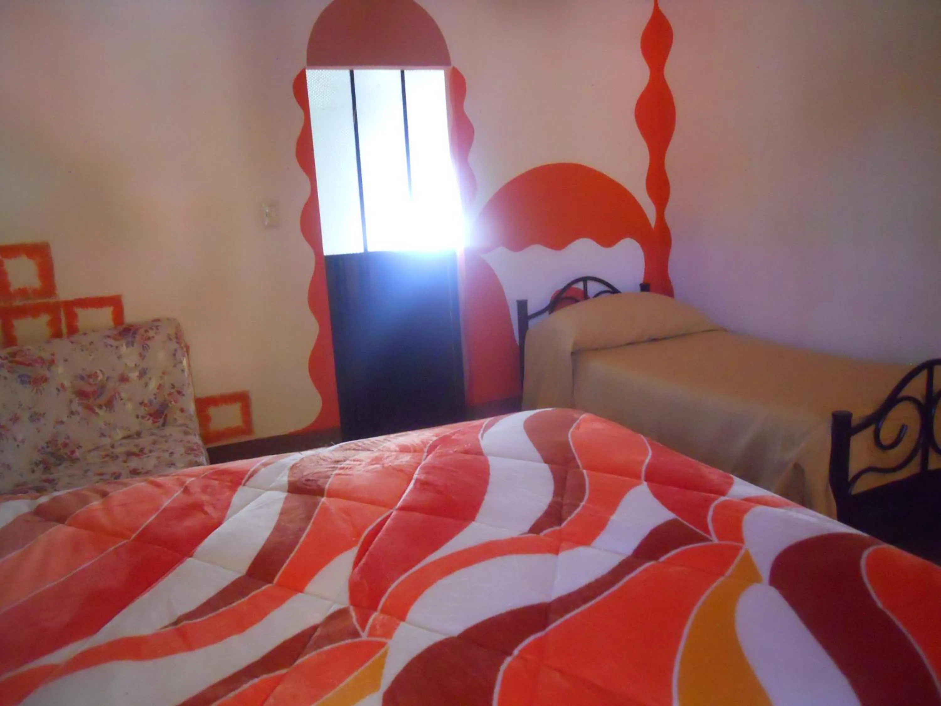 Bed in Hostal La Casa del Sol