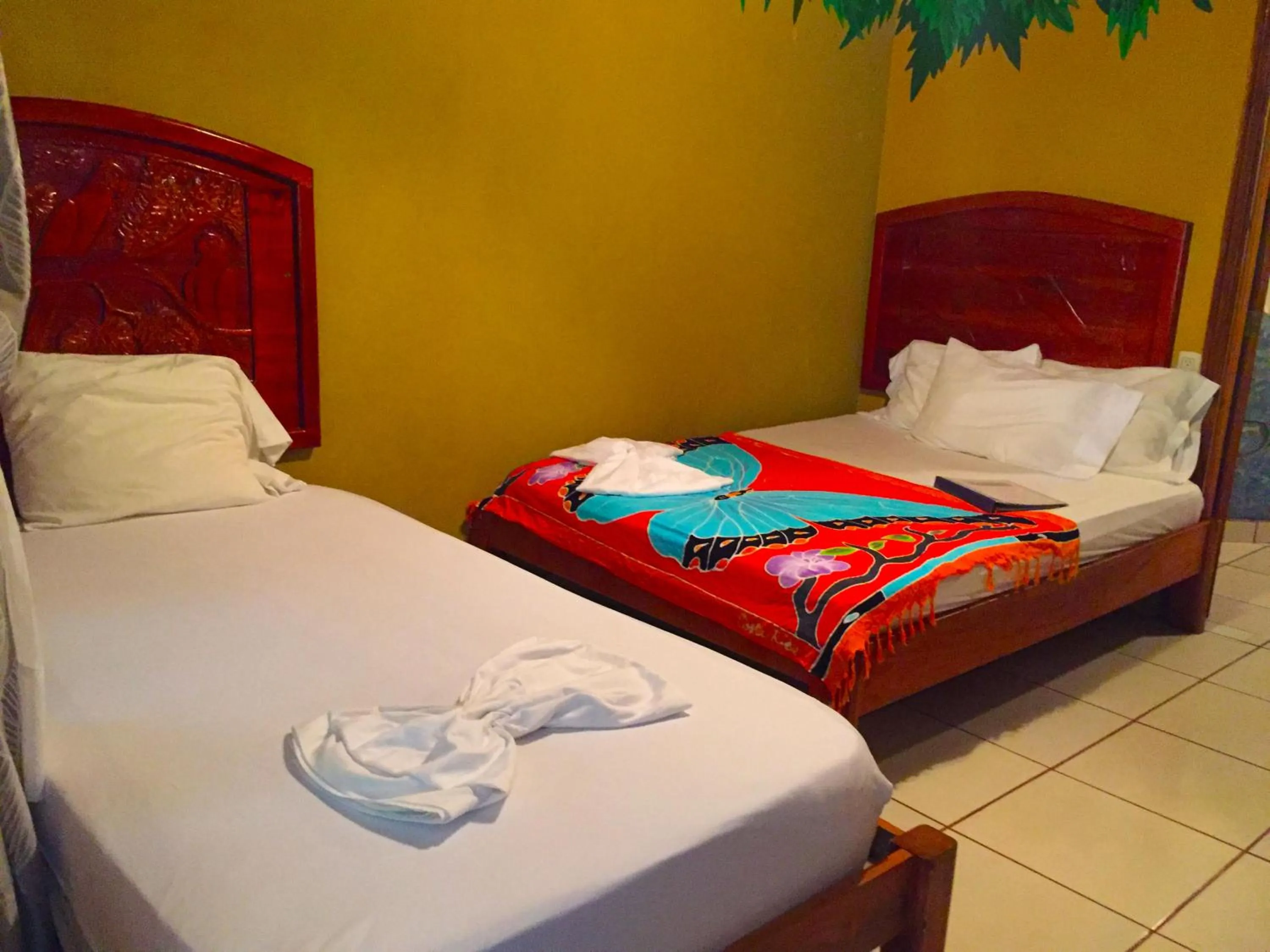 Photo of the whole room, Bed in Cabinas Jimenez