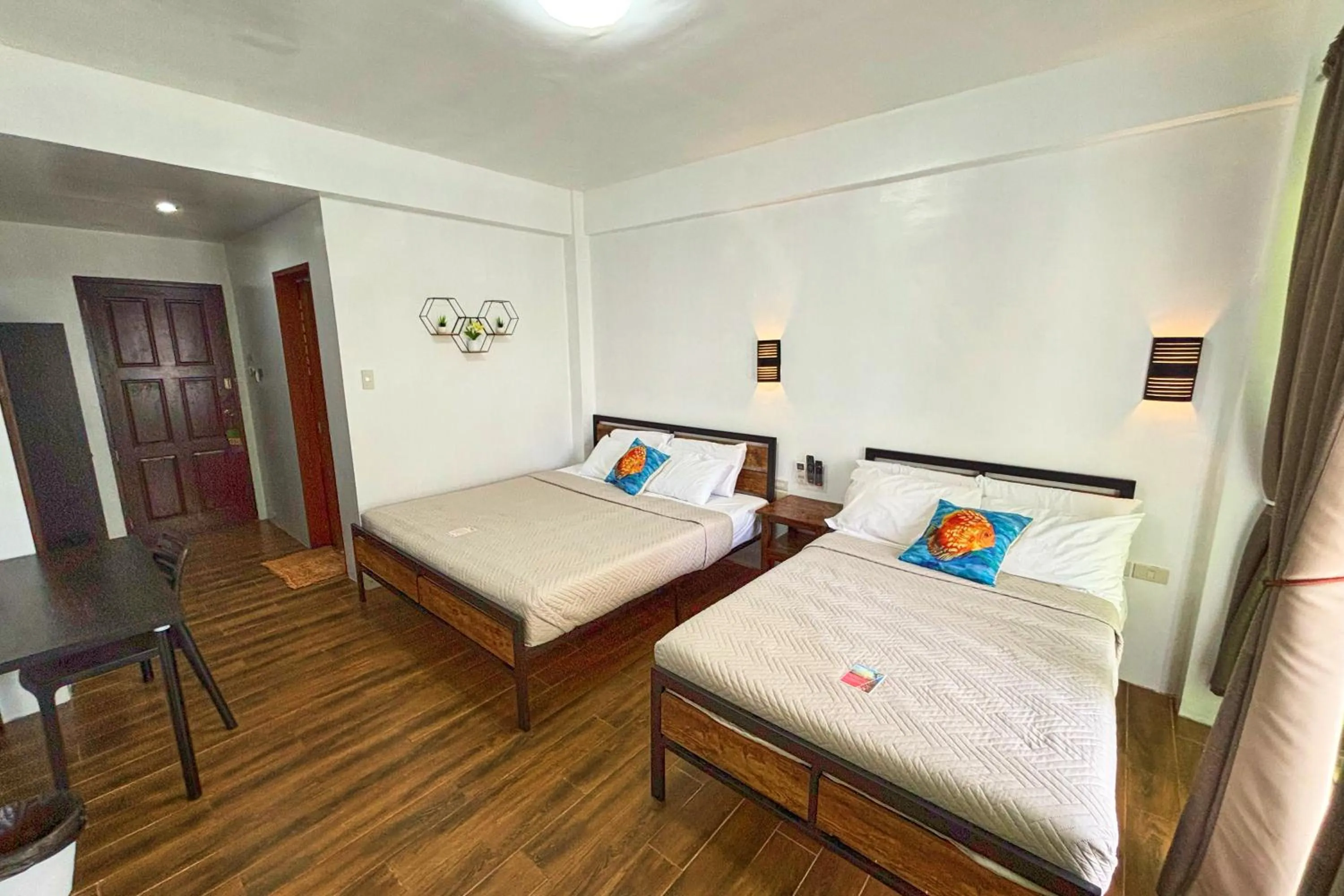 Bed in Arkipelago Divers and Beach Resort