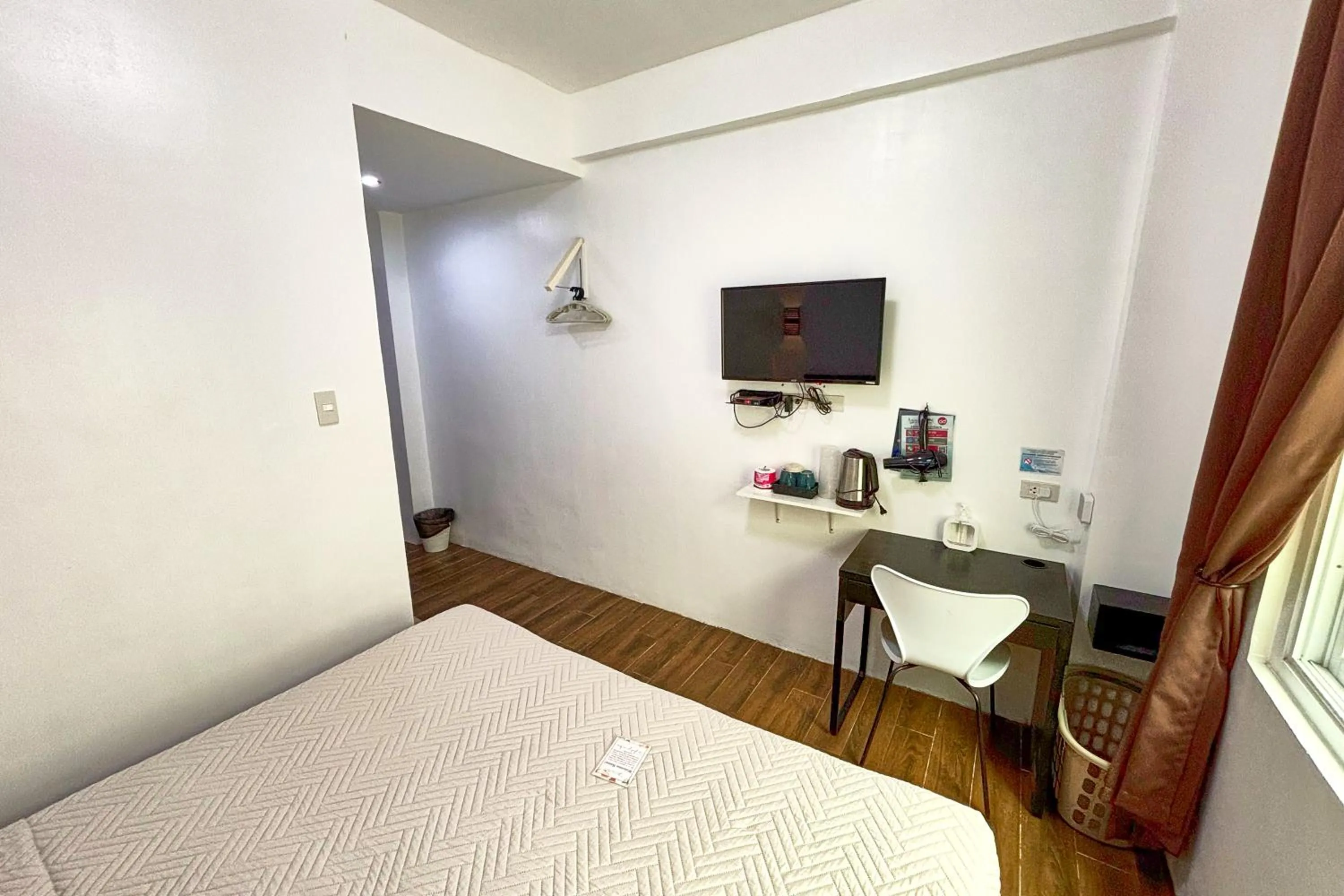 Bed in Arkipelago Divers and Beach Resort