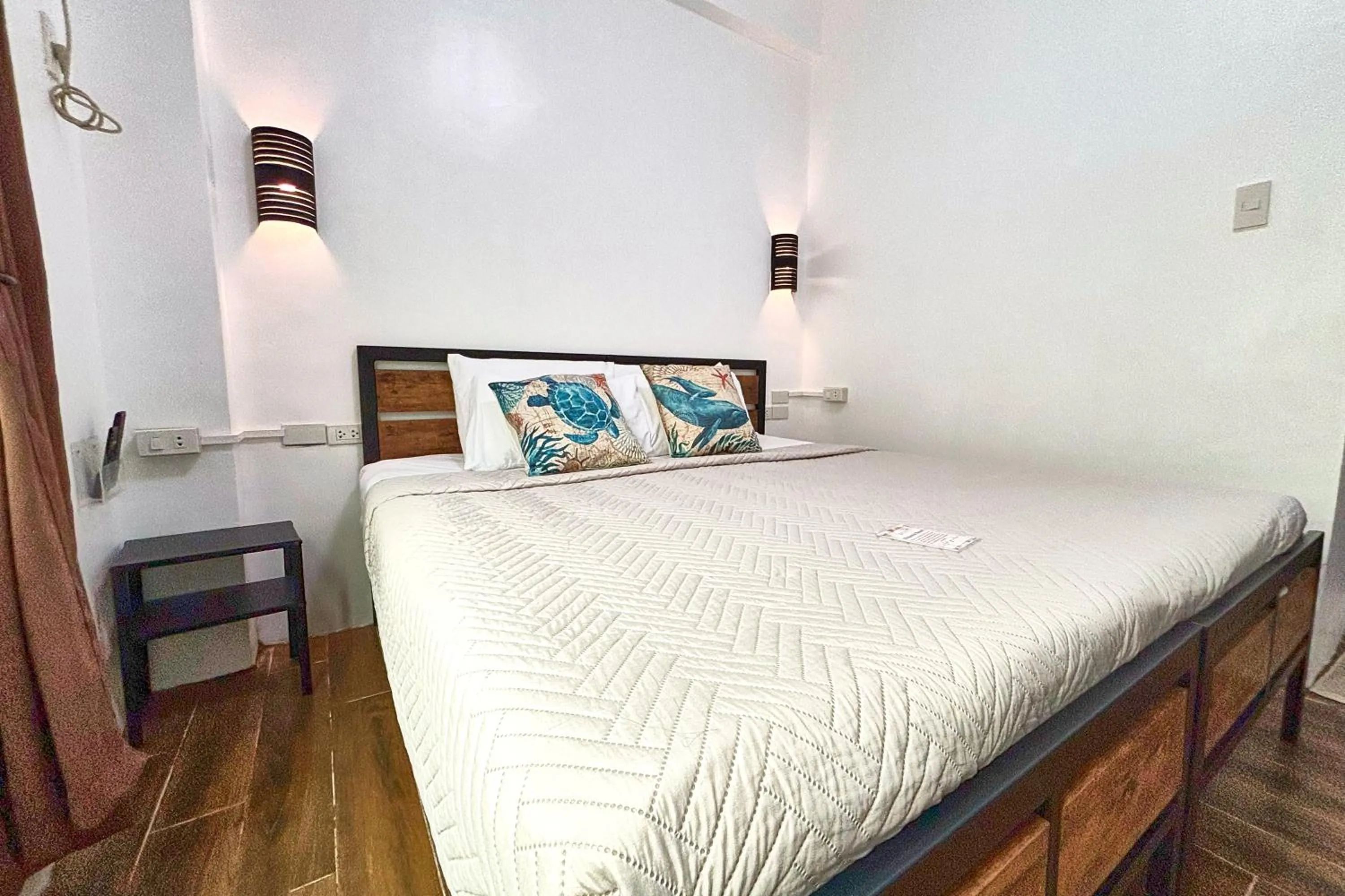 Bed in Arkipelago Divers and Beach Resort