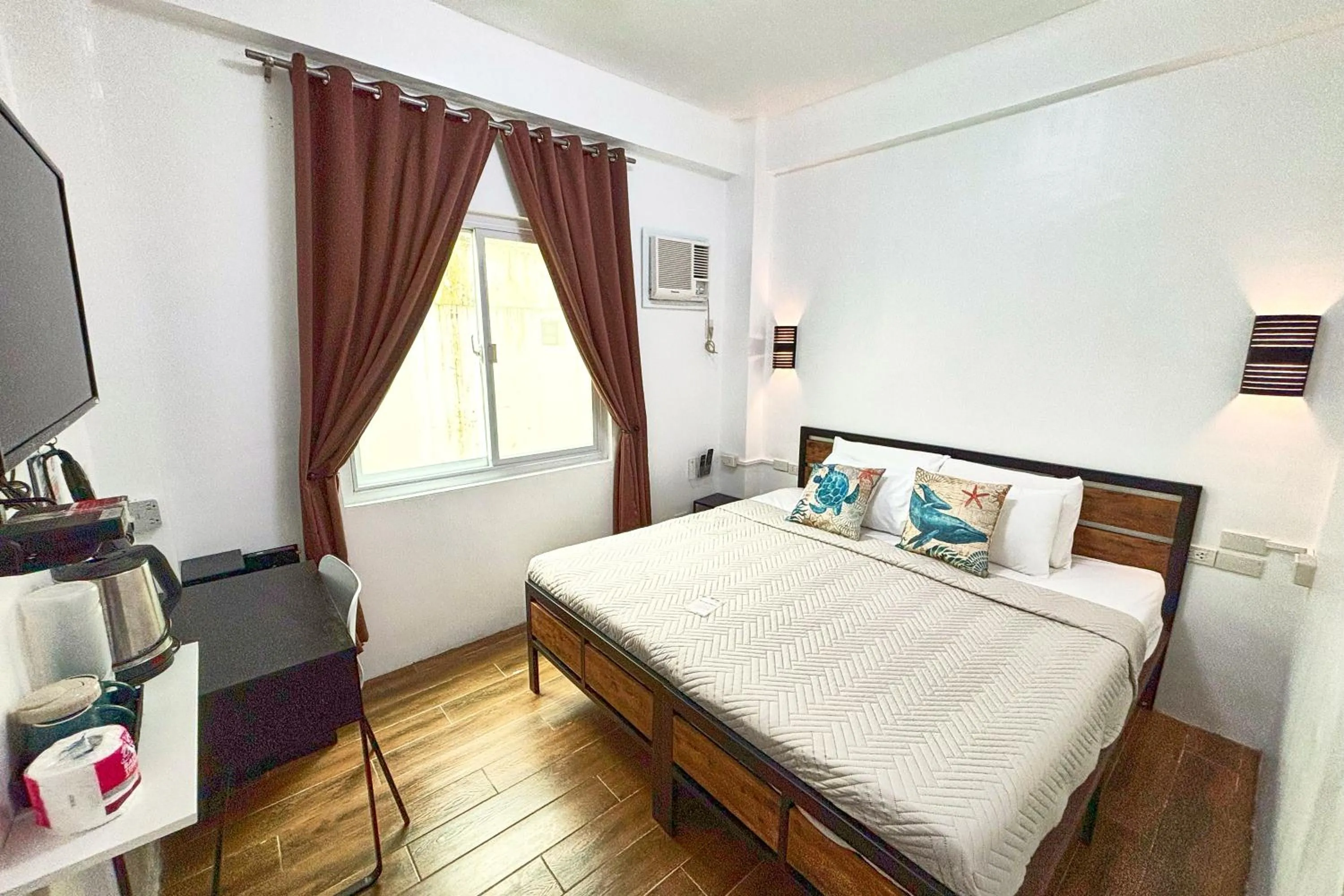 Bed in Arkipelago Divers and Beach Resort