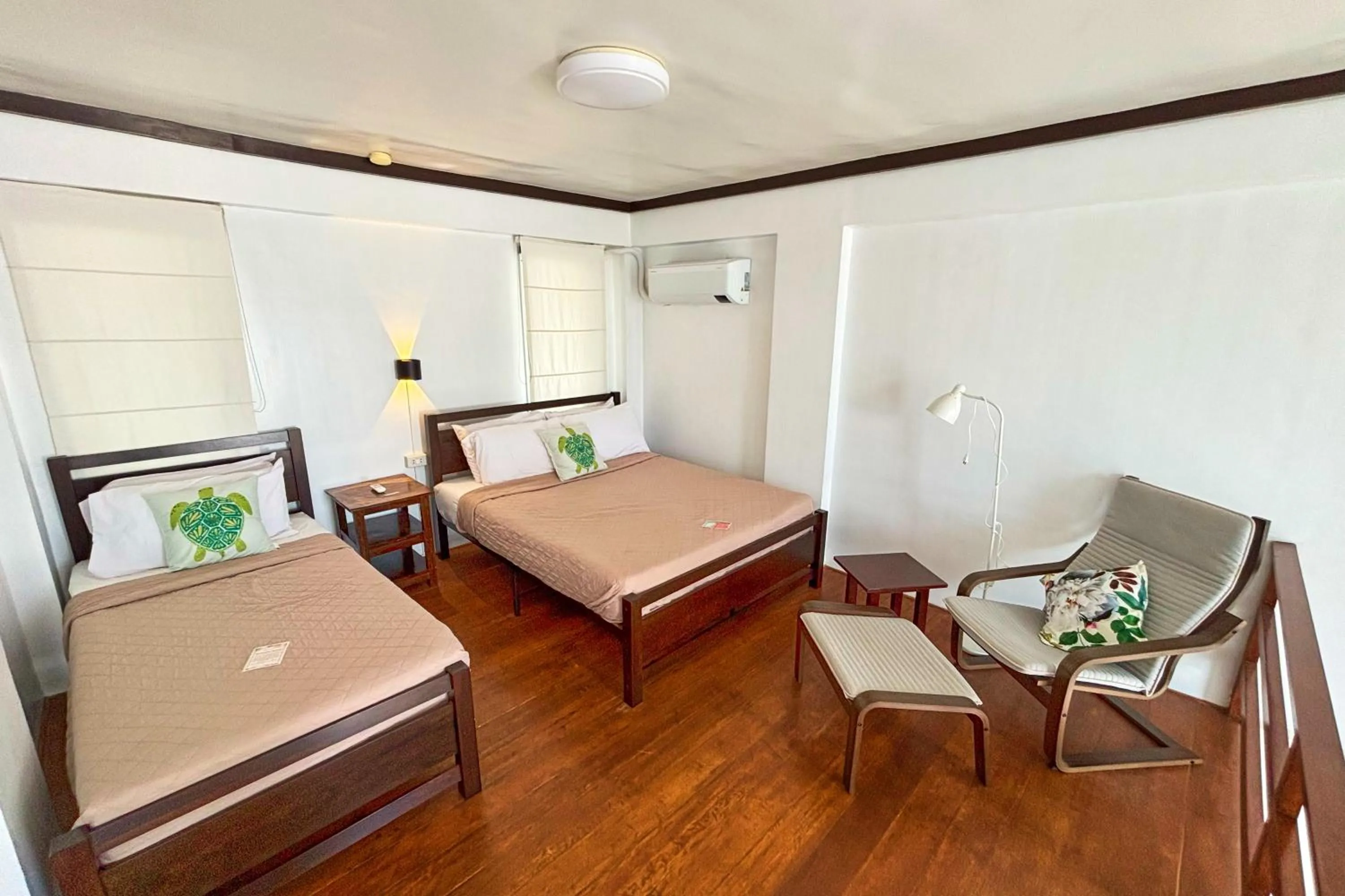 Bed in Arkipelago Divers and Beach Resort