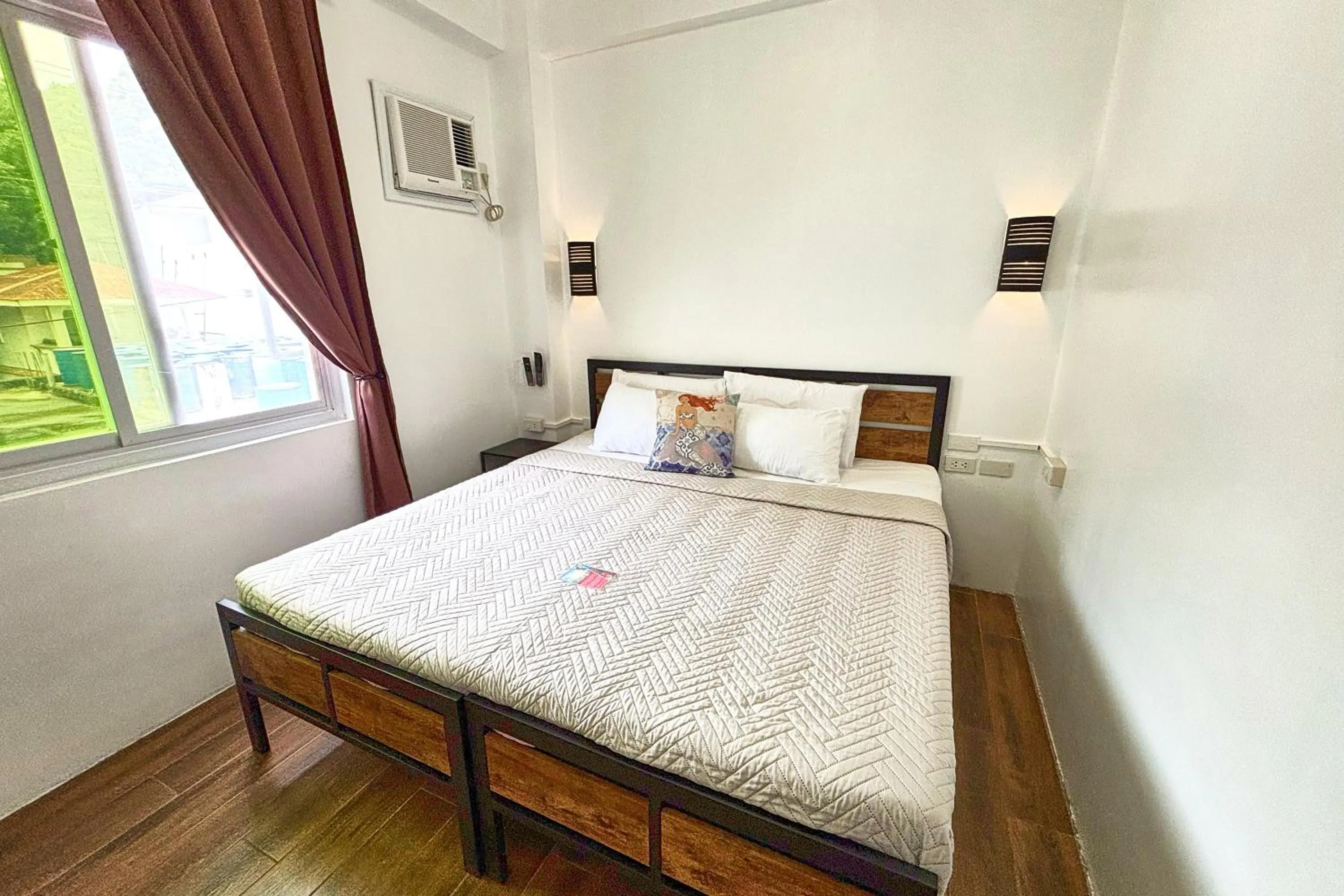 Bed in Arkipelago Divers and Beach Resort