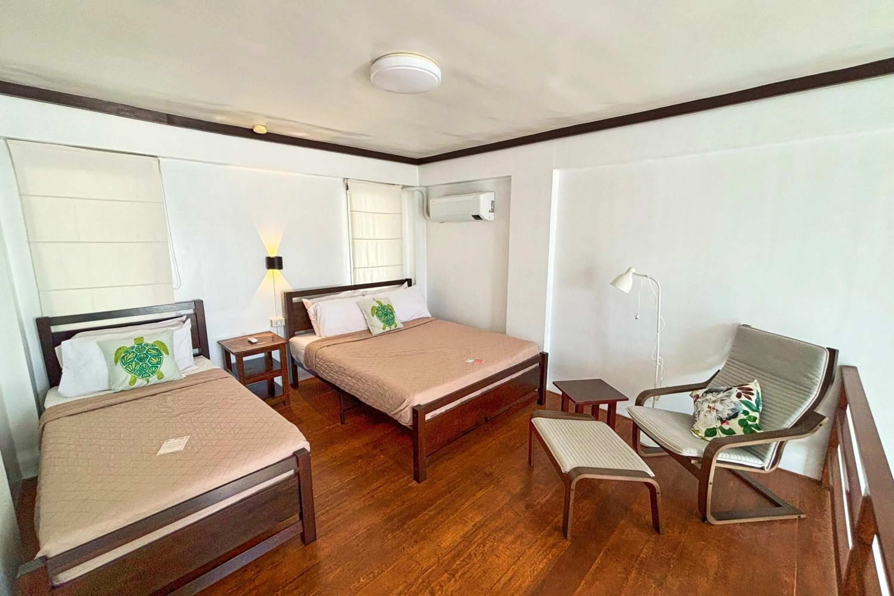 Bed in Arkipelago Divers and Beach Resort