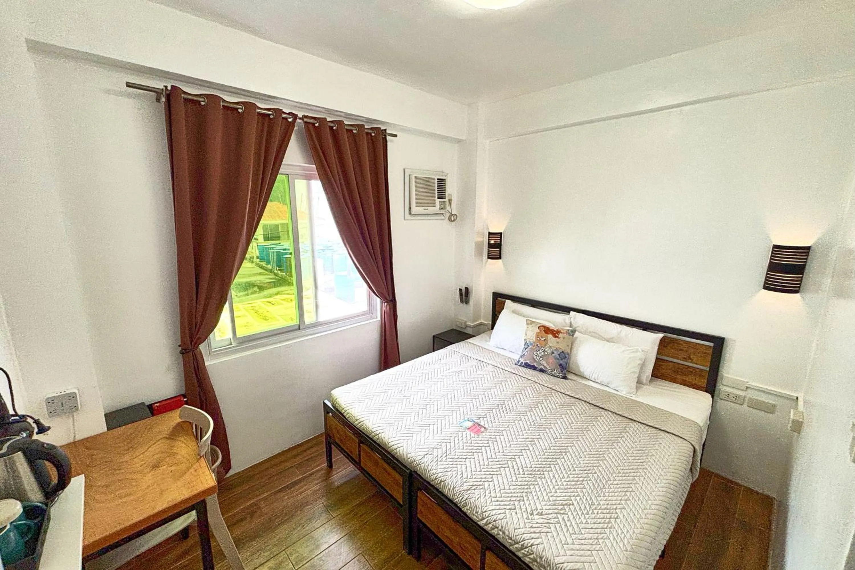 Bed in Arkipelago Divers and Beach Resort