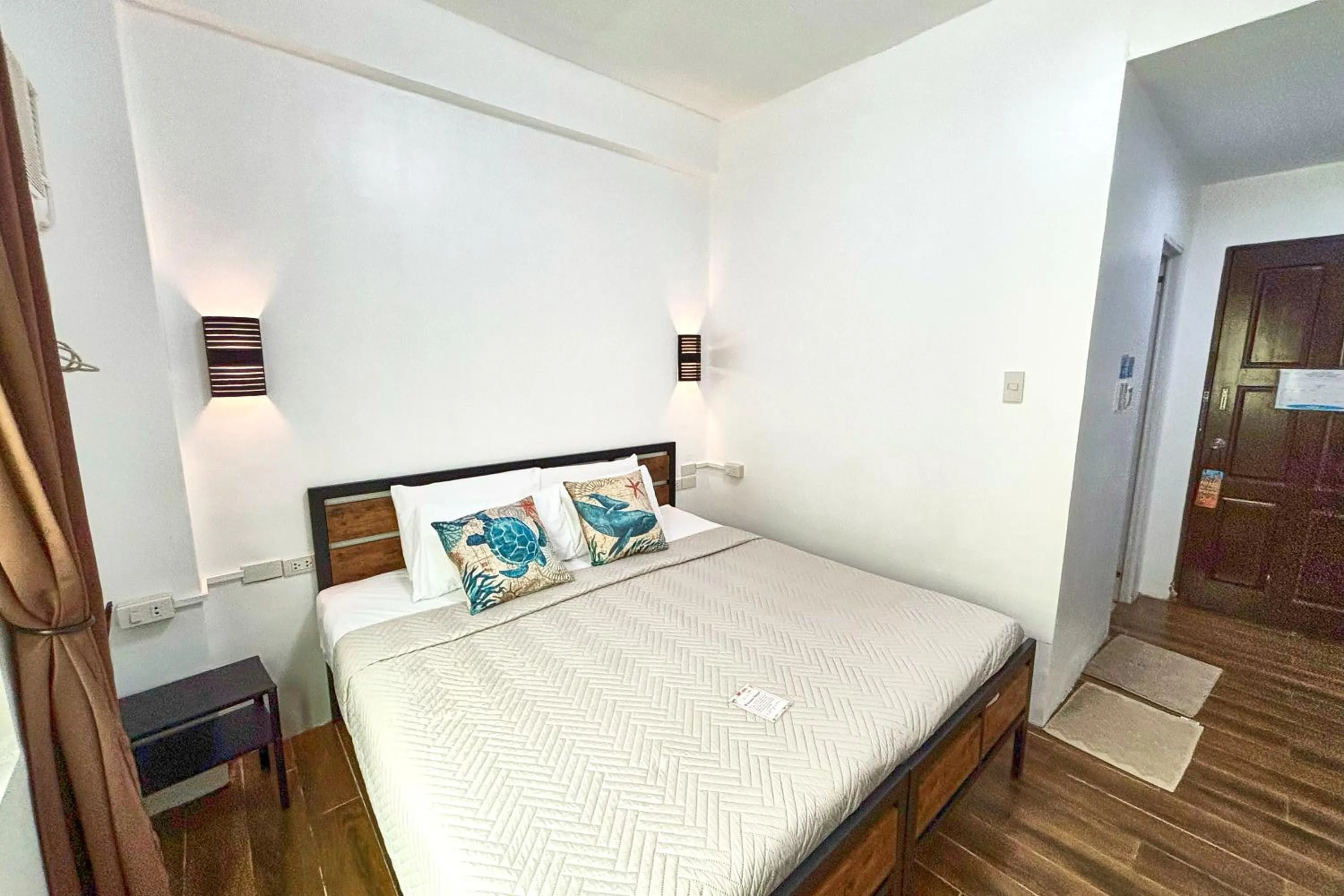 Bed in Arkipelago Divers and Beach Resort