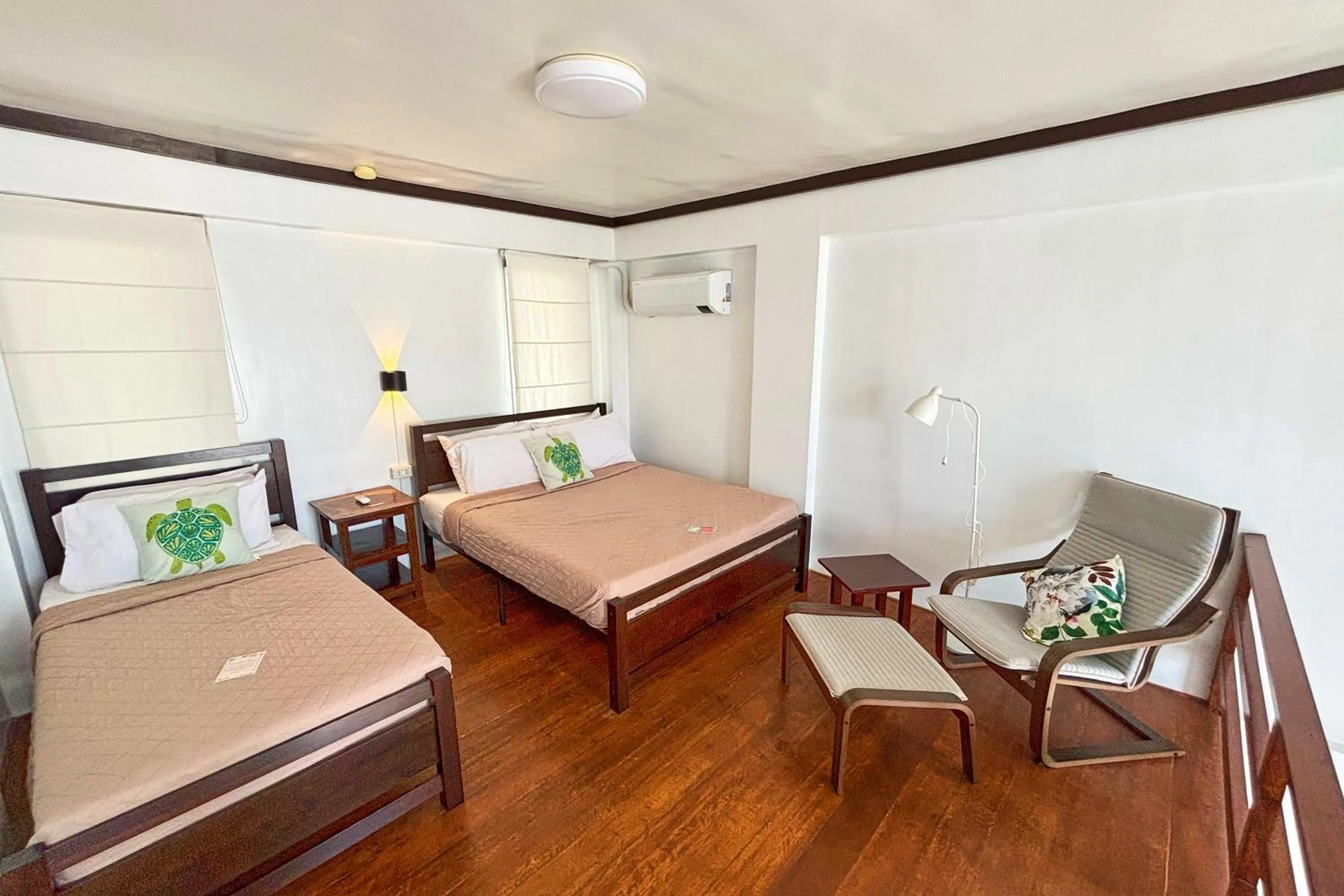 Bed in Arkipelago Divers and Beach Resort