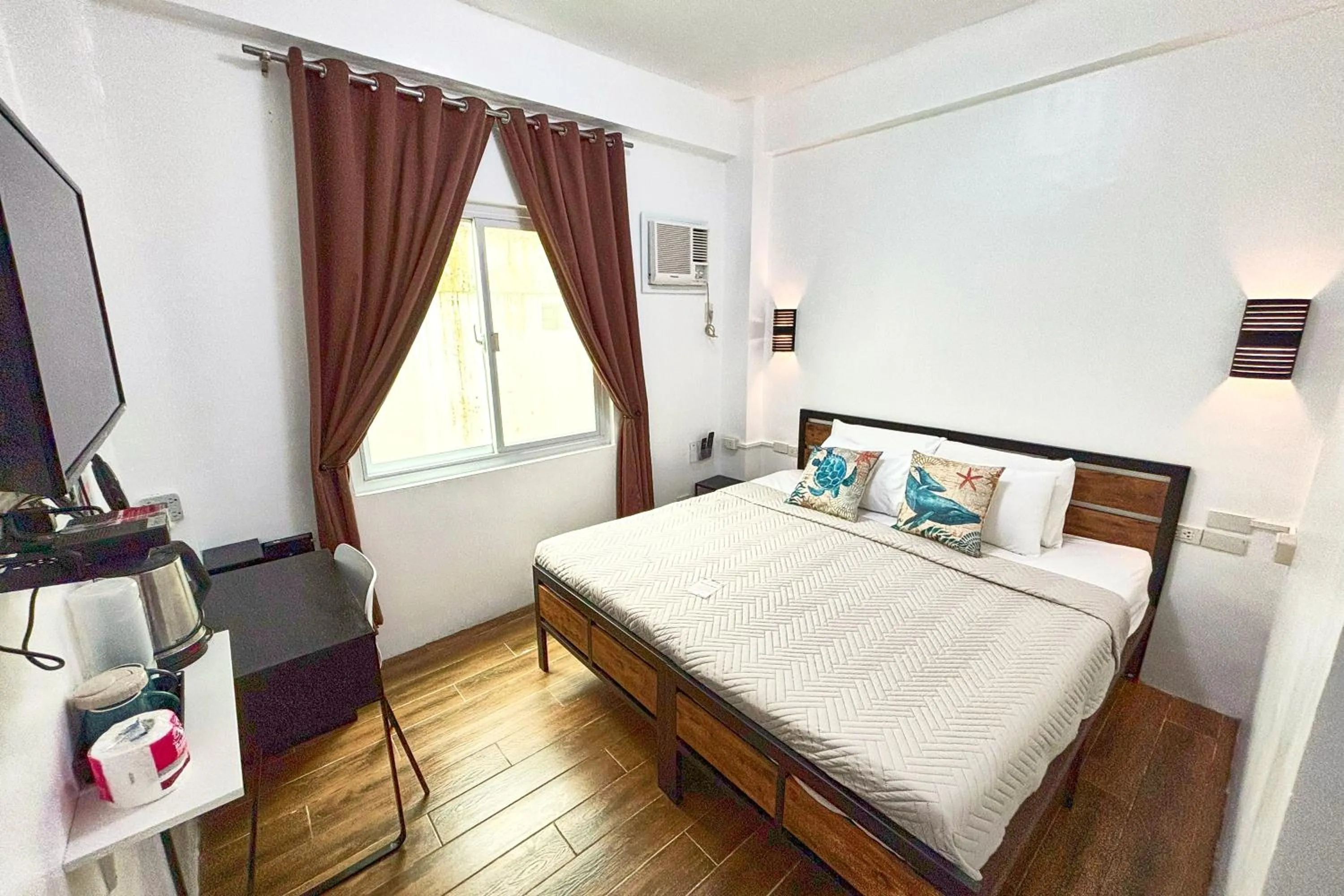 Bed in Arkipelago Divers and Beach Resort