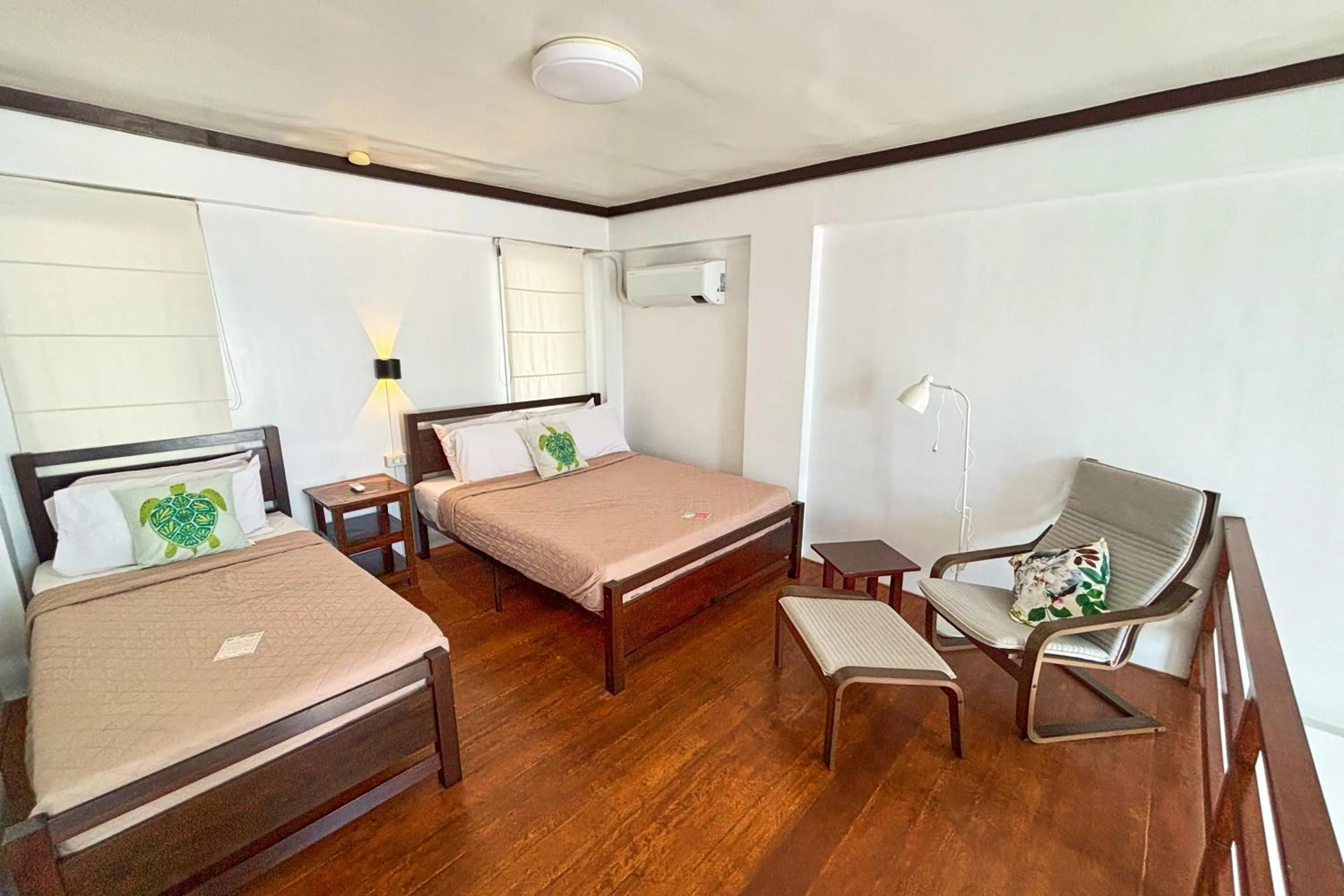 Bed in Arkipelago Divers and Beach Resort