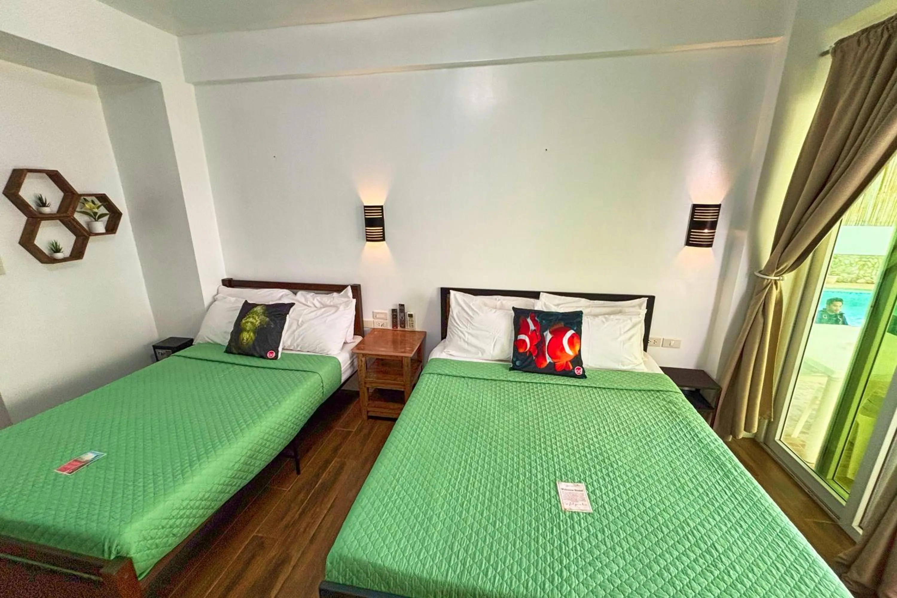 Bed in Arkipelago Divers and Beach Resort